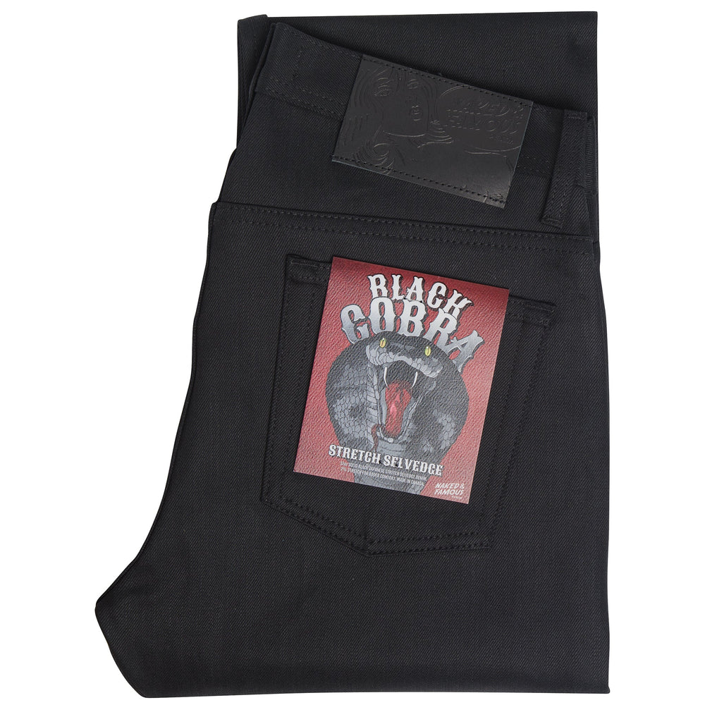 Black pants with a brand label on a white background