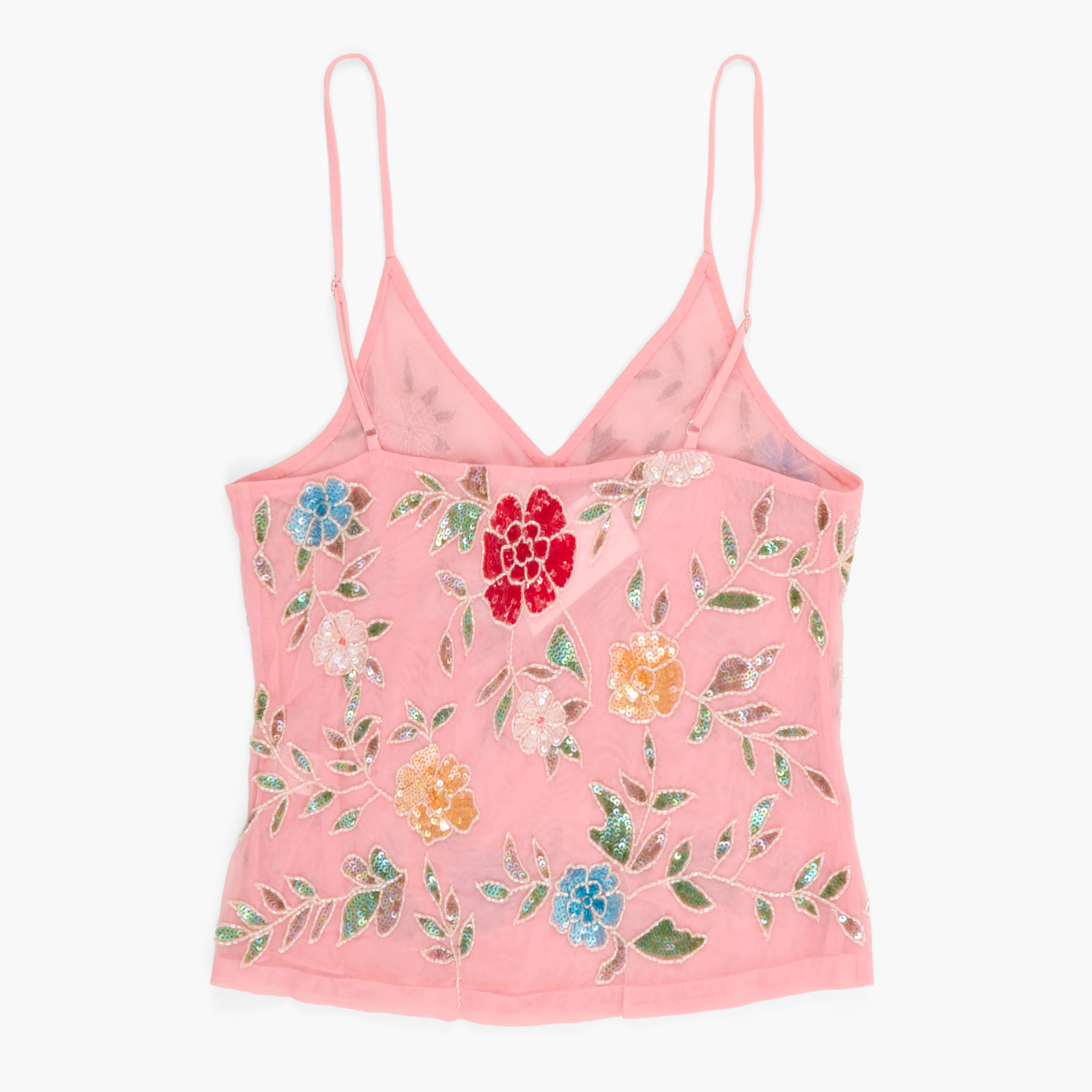 Pink floral embroidered top on a white background, back view