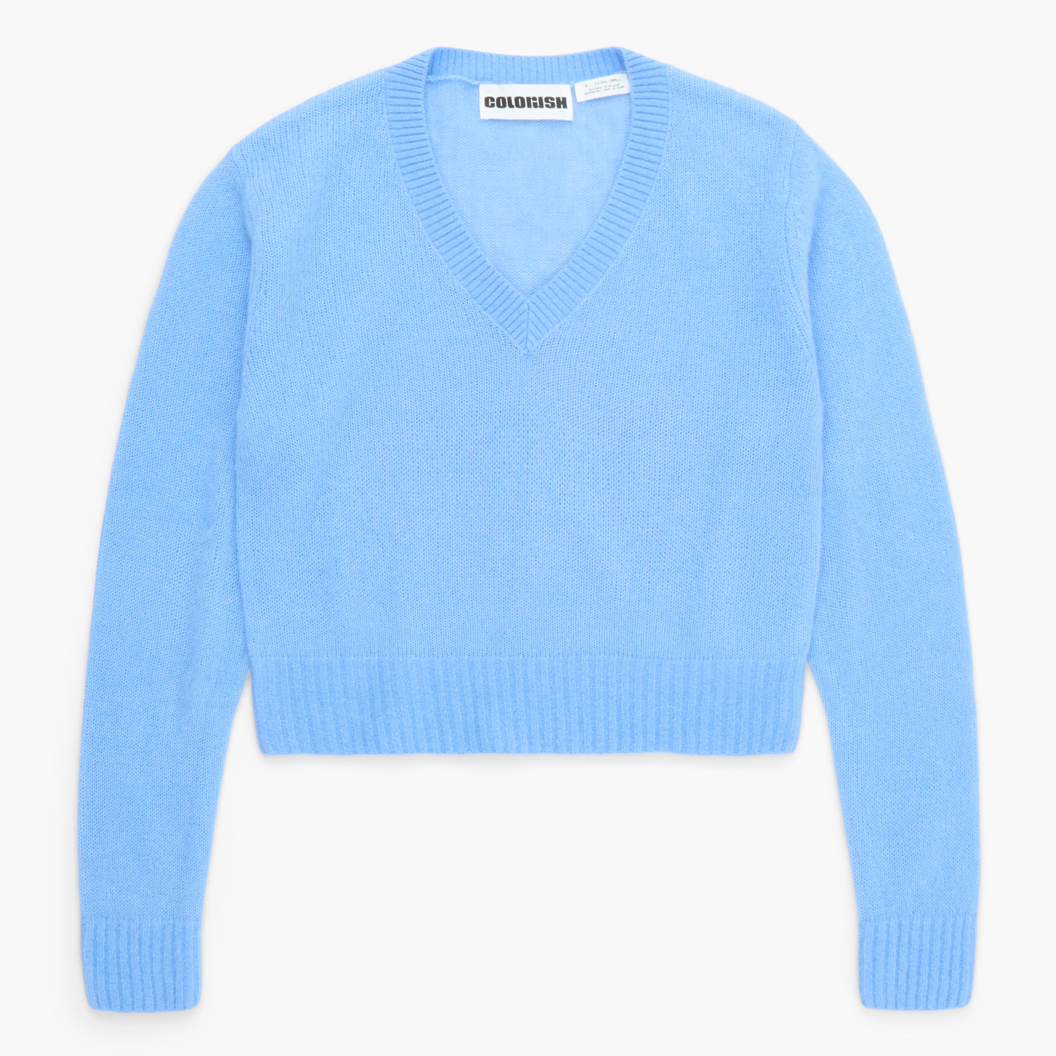 Light blue sweater on a white background