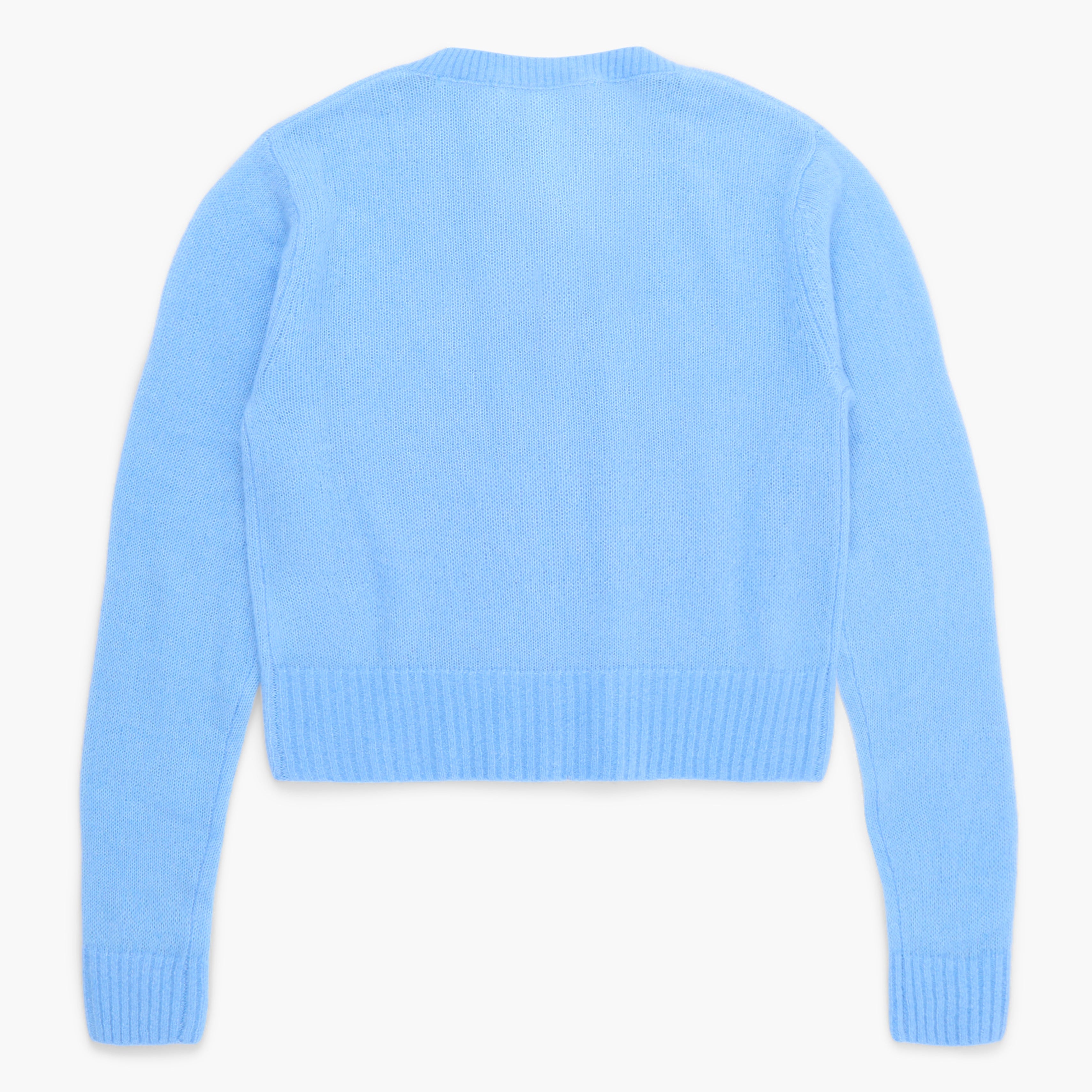 Light blue sweater on a white background