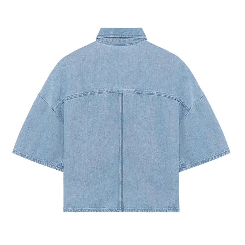 Light blue denim shirt on a white background
