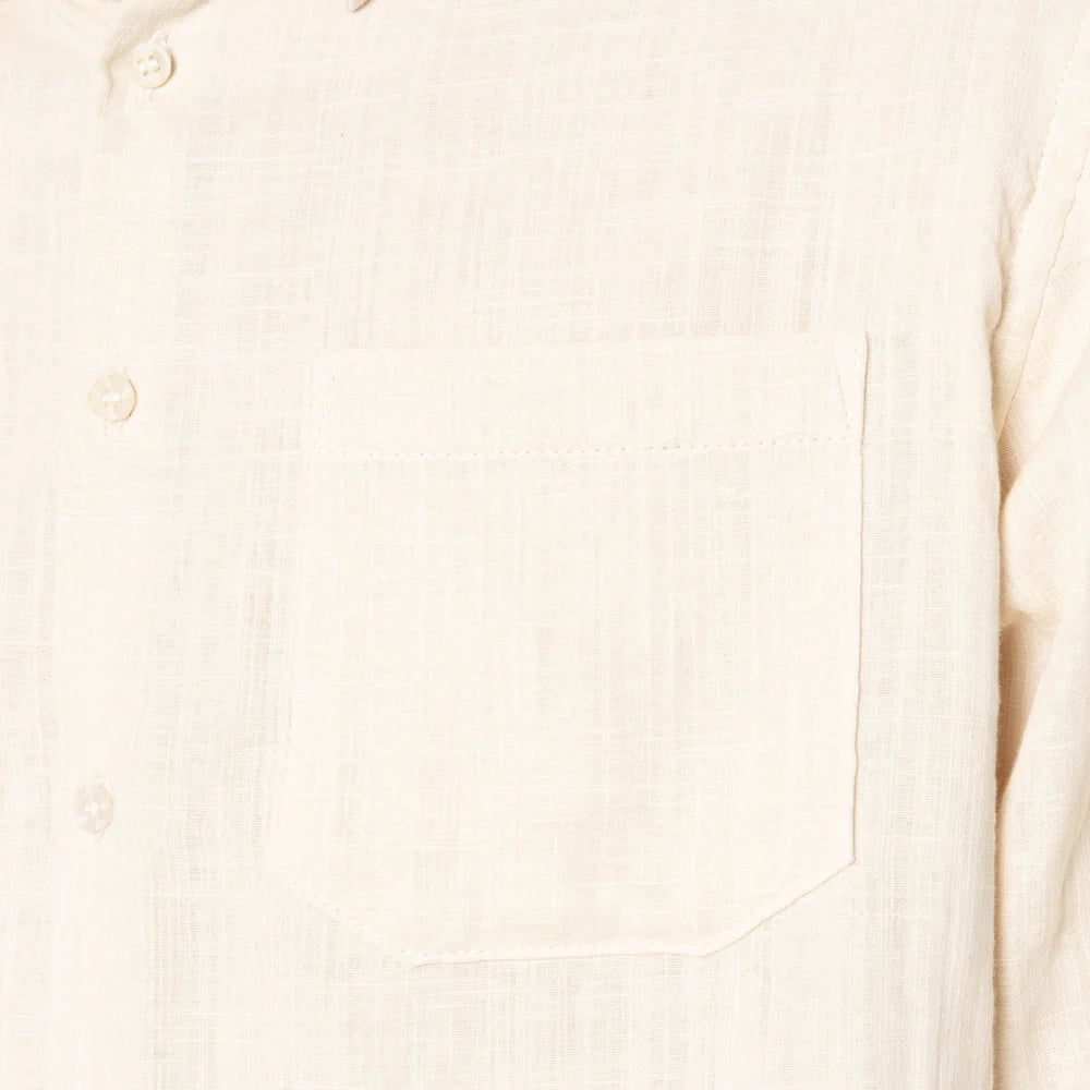 Close-up of a beige fabric texture
