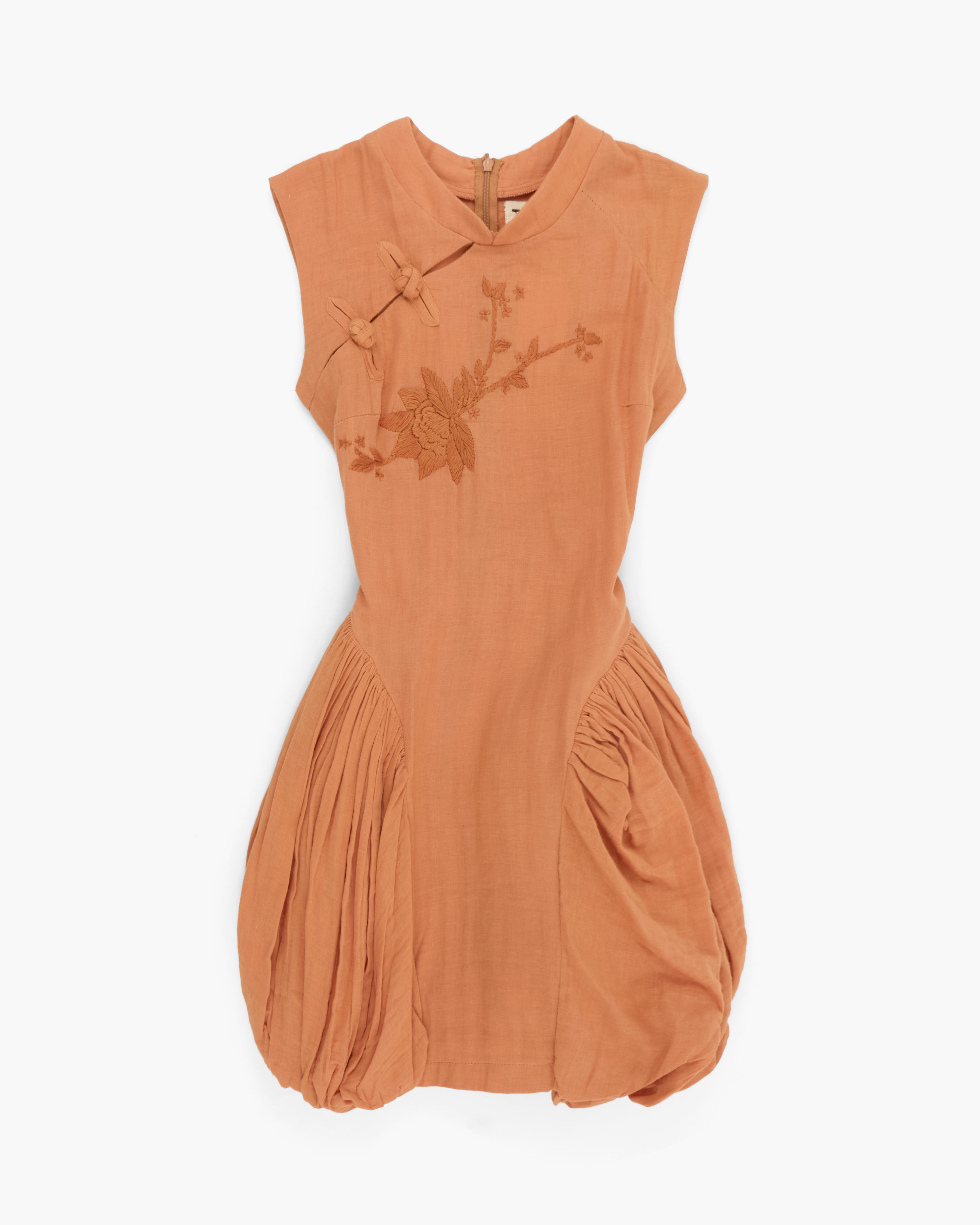 Brown dress with floral embroidery on a white background