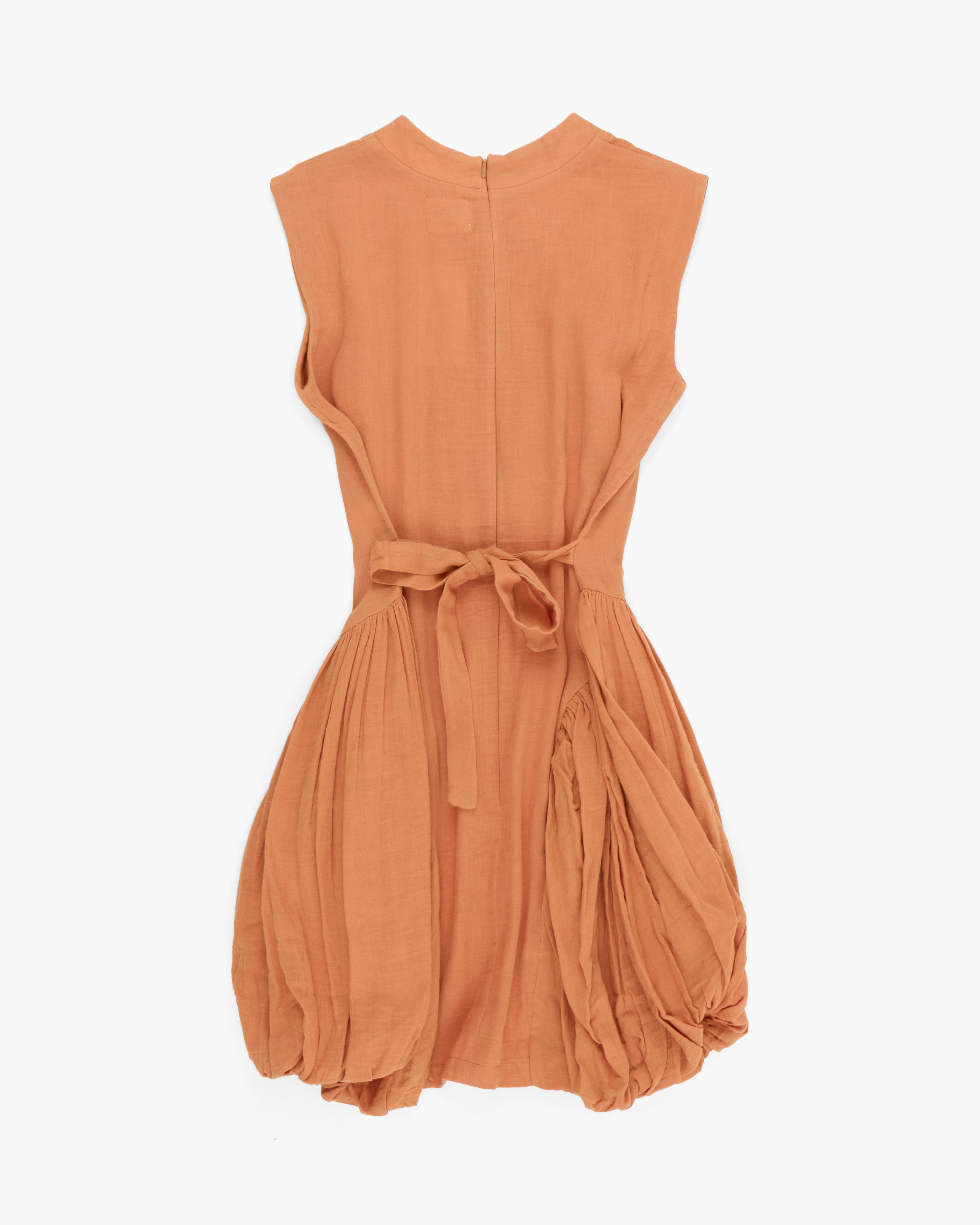 Brown dress with a tie waist on a white background