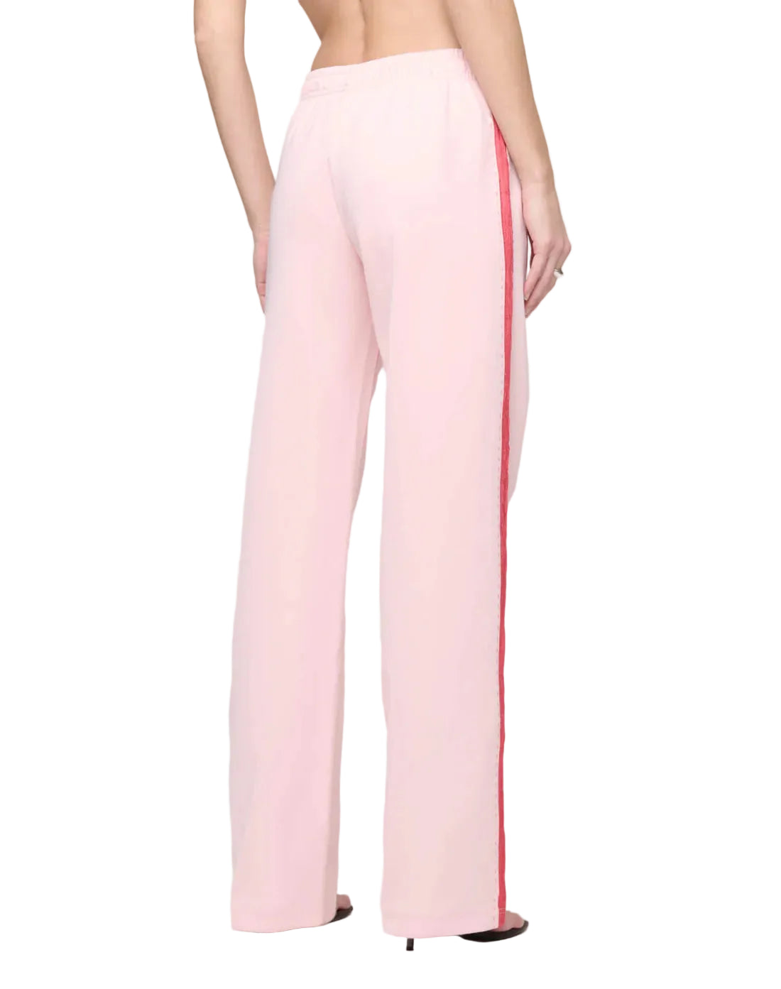 Pink pants with a red stripe on a white background