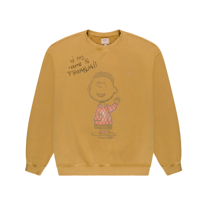 Mustard yellow sweatshirt with a graphic design on a white background