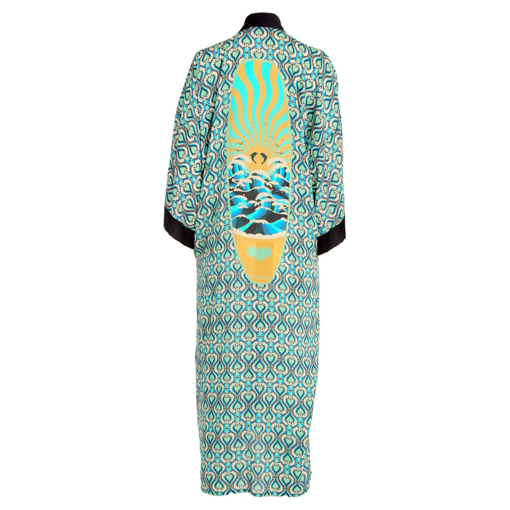 Colorful patterned dress with a unique design on a white background