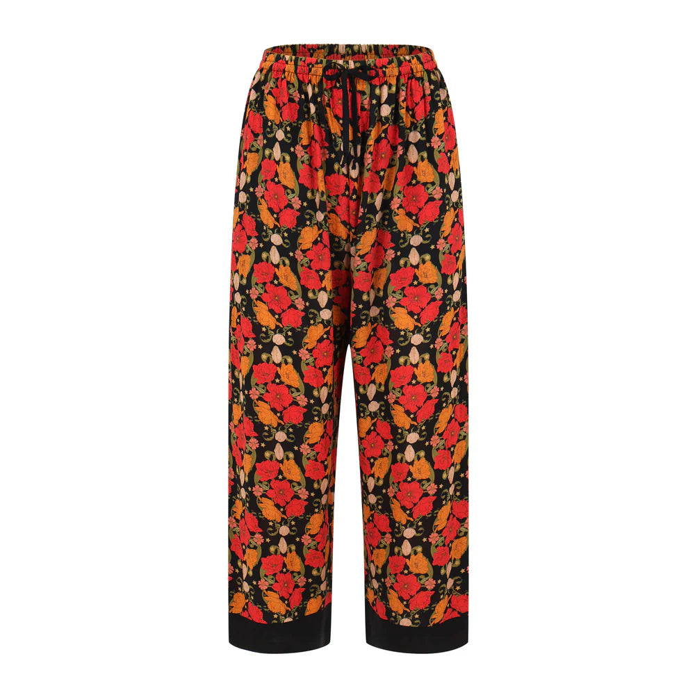 Colorful floral-patterned pants on a white background