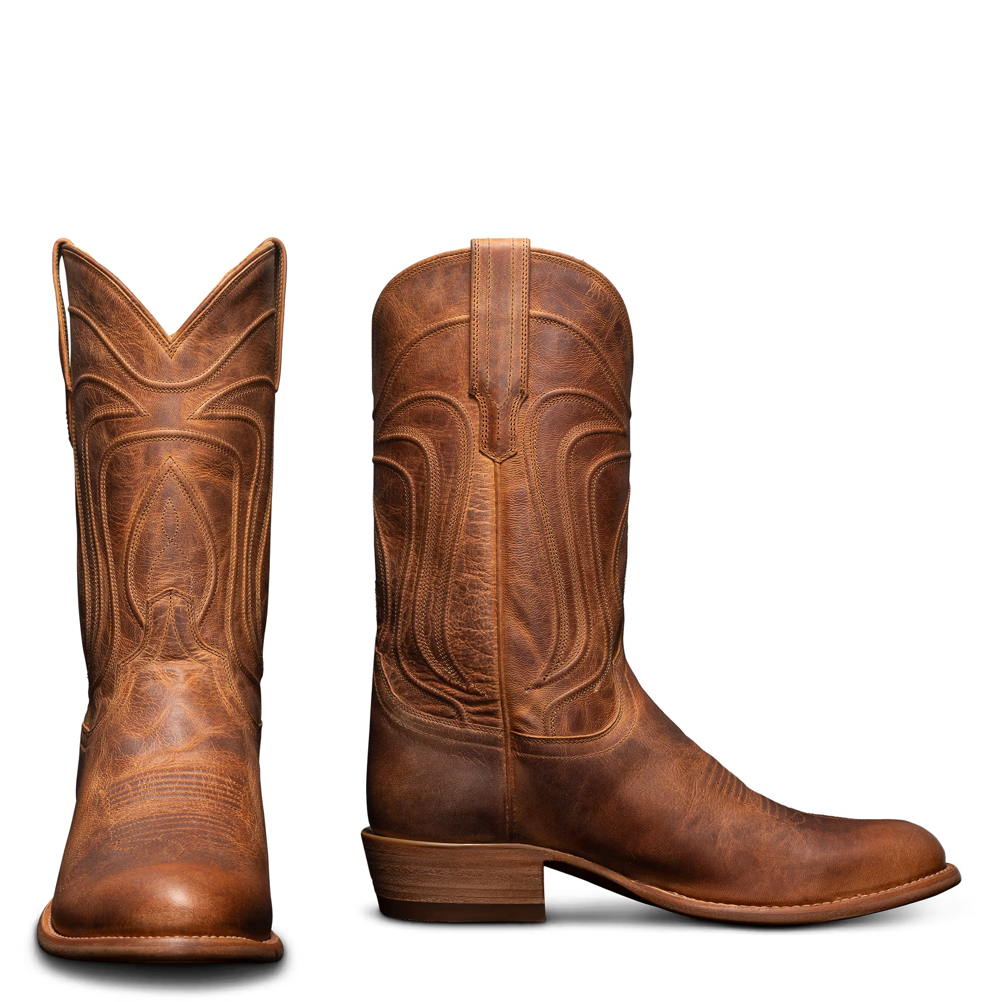 Brown cowboy boots on a white background