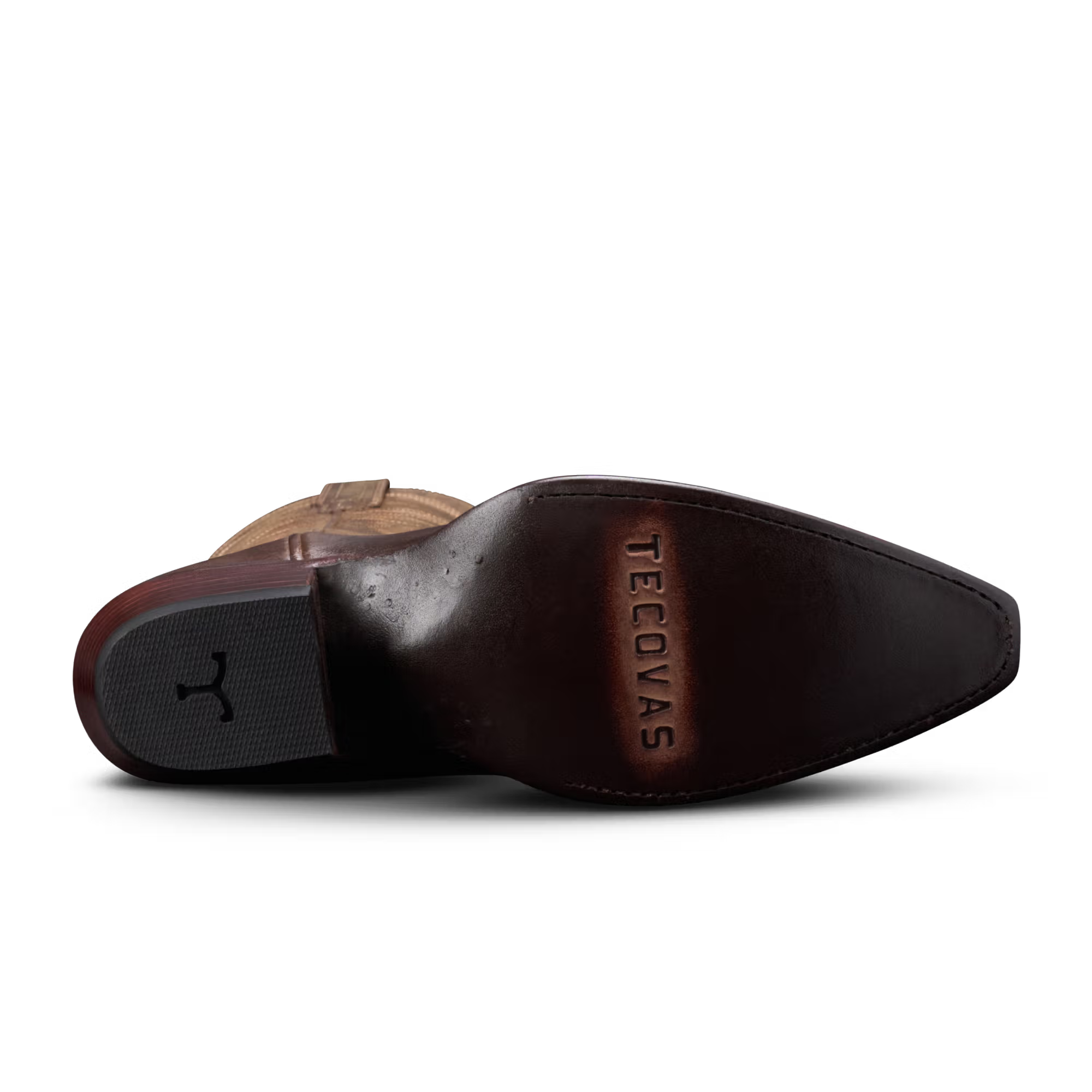 Dark brown leather boot sole with 'Tecovas' branding on a white background