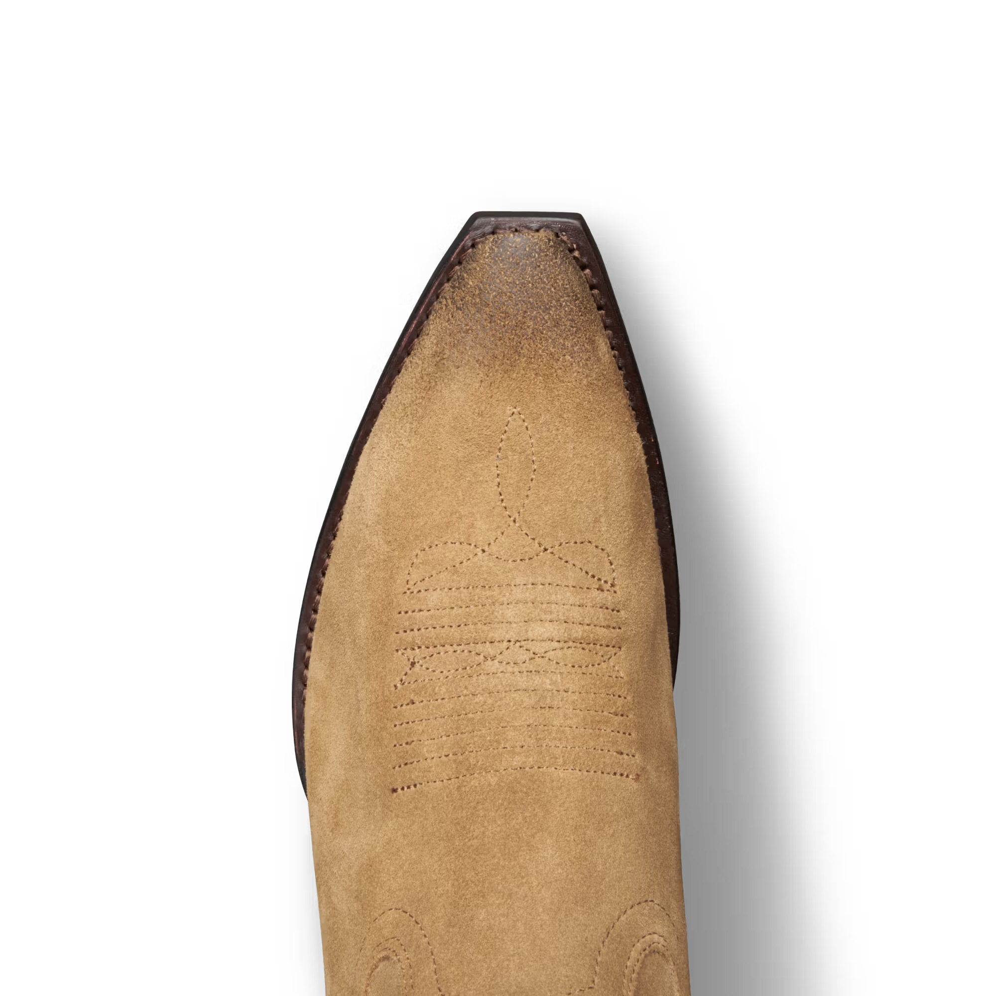 Tan cowboy boot with detailed sole on a white background