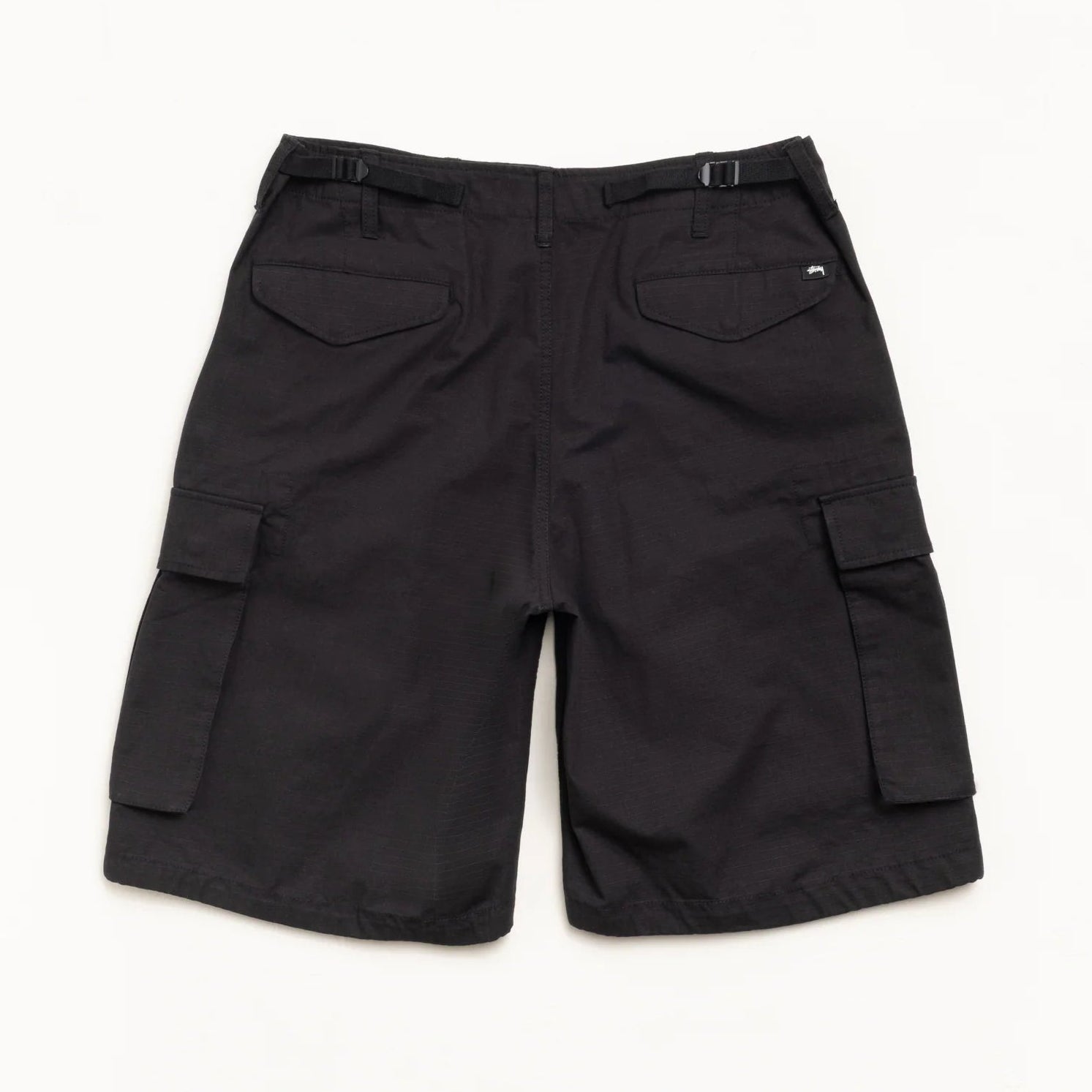 Black cargo shorts on a white background