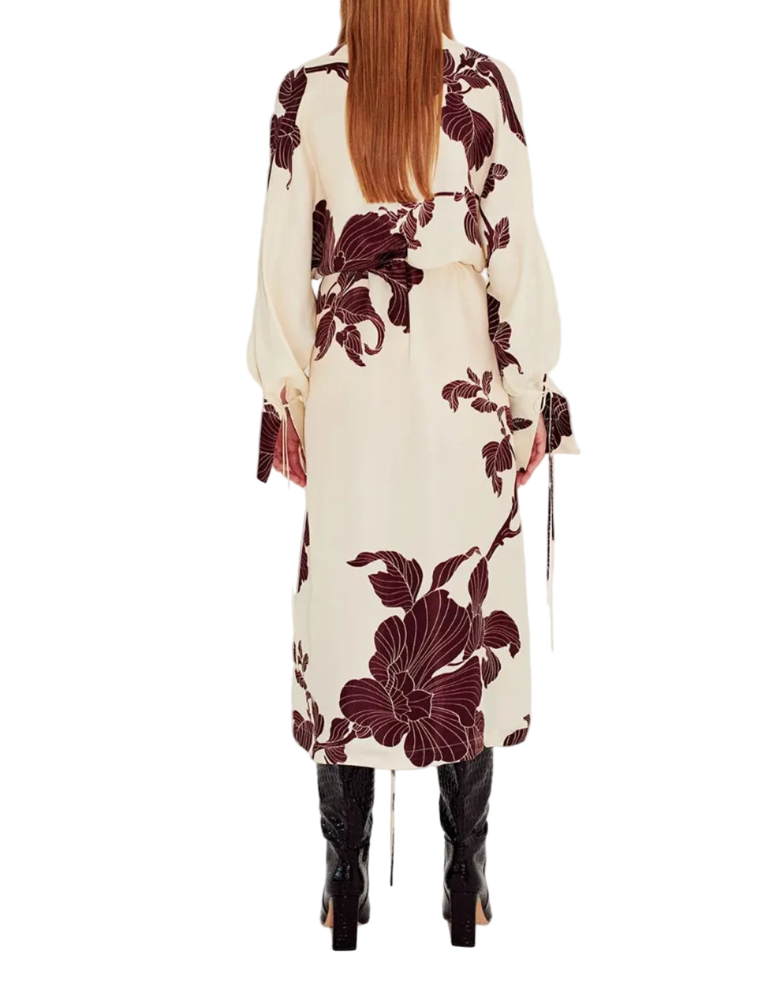 Woman wearing a floral kimono with a white background