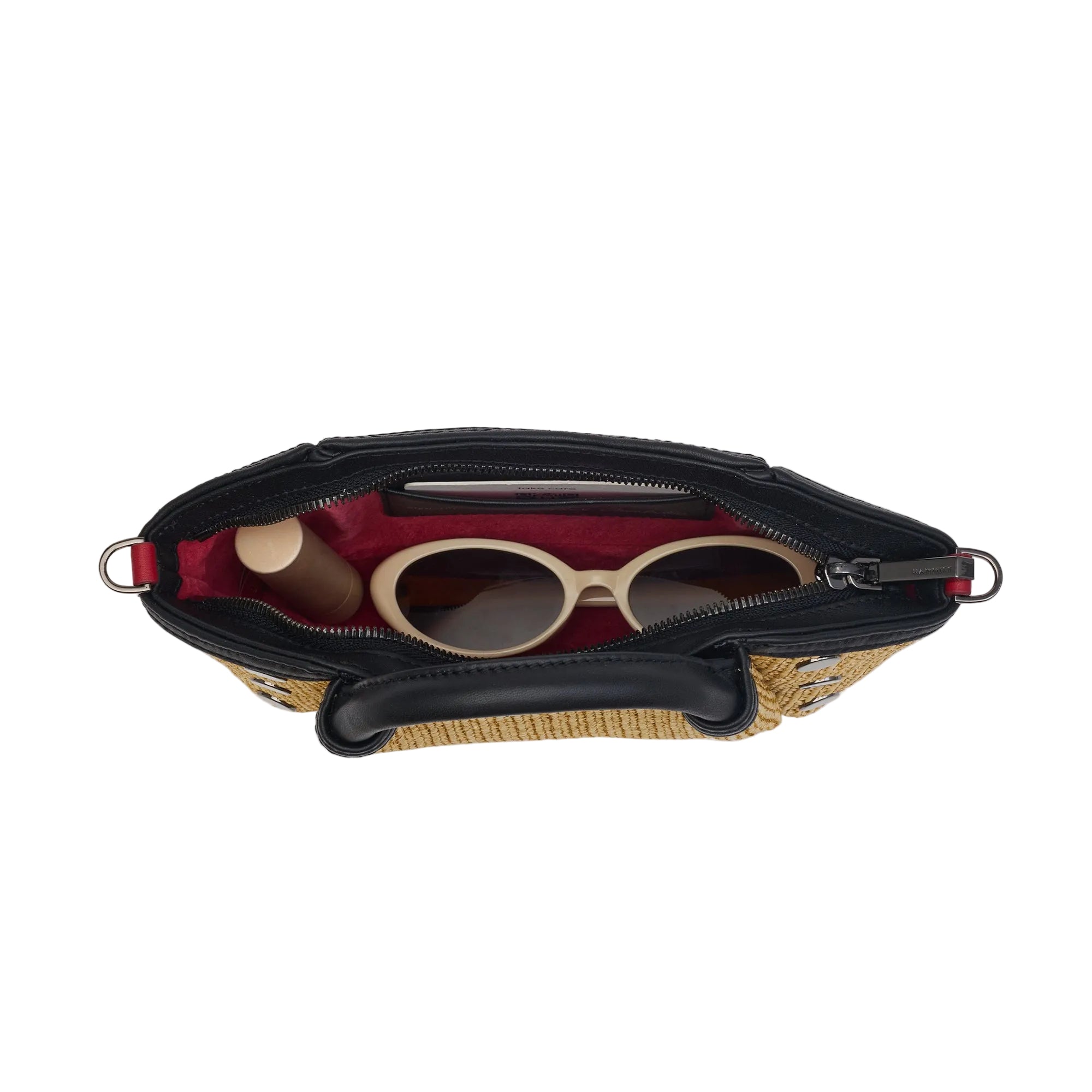Interior view of a tan textured convertible mini bag with black accents on a white background