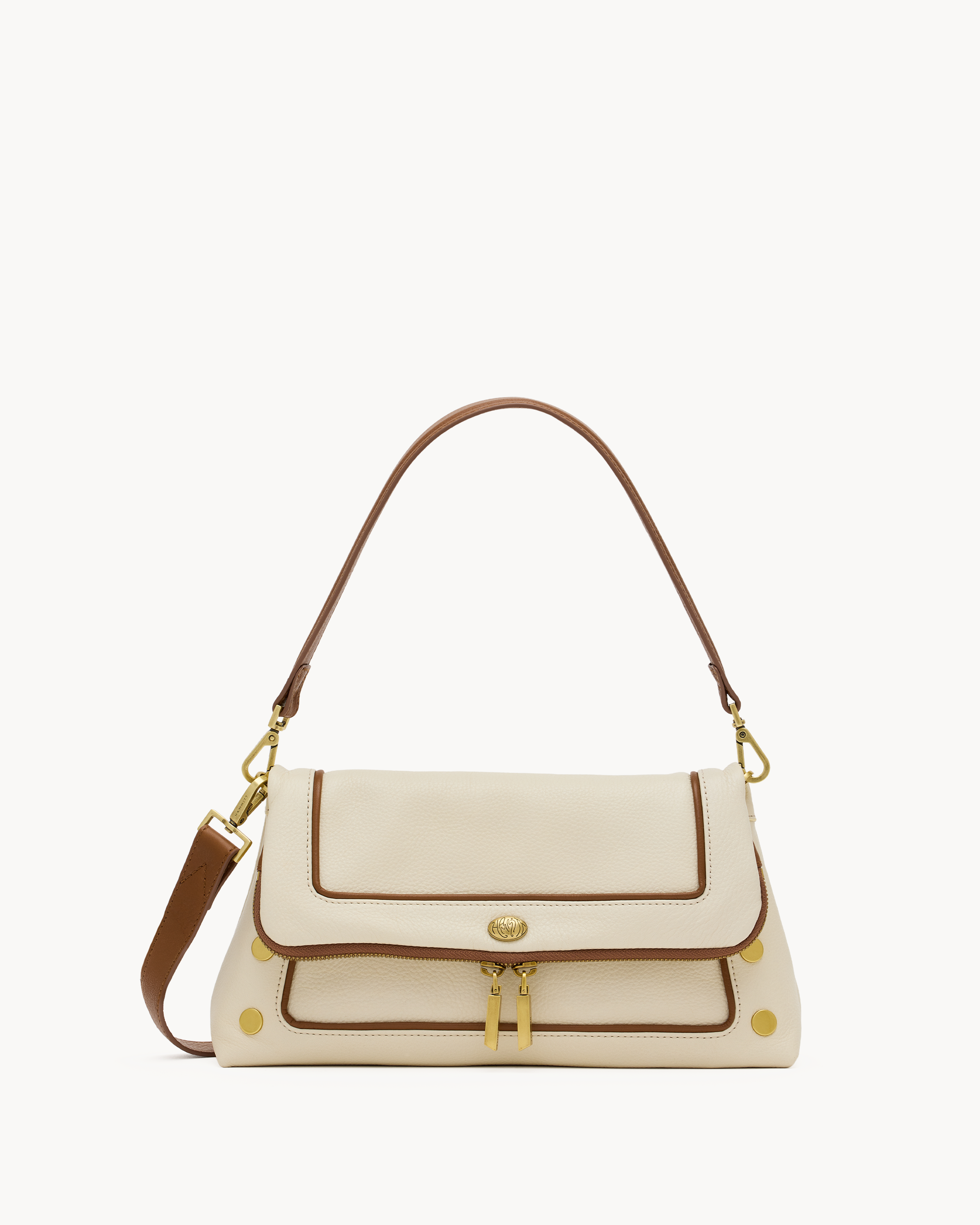 Cream purse with brown trim on a white background