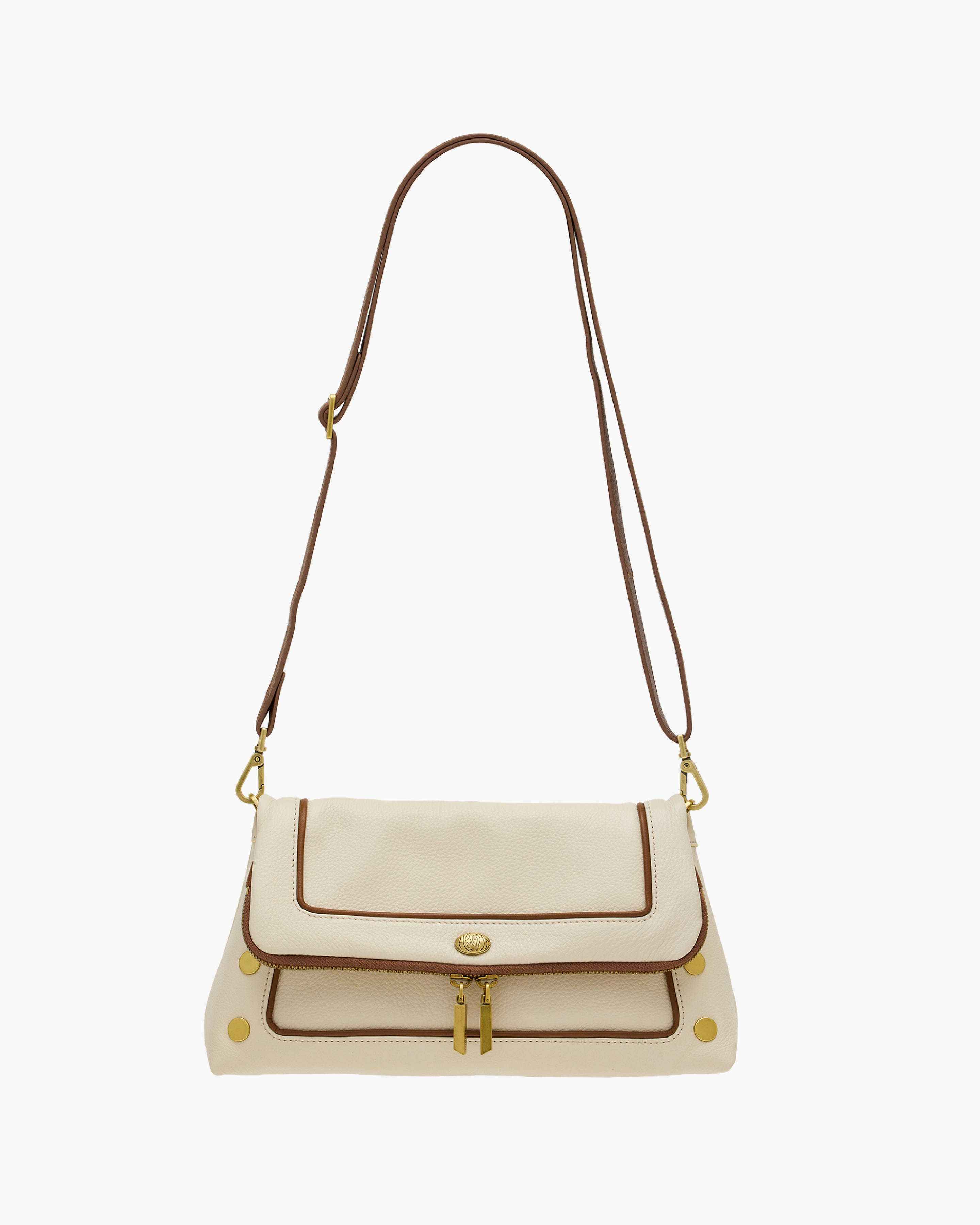 Cream purse with brown trim on a white background