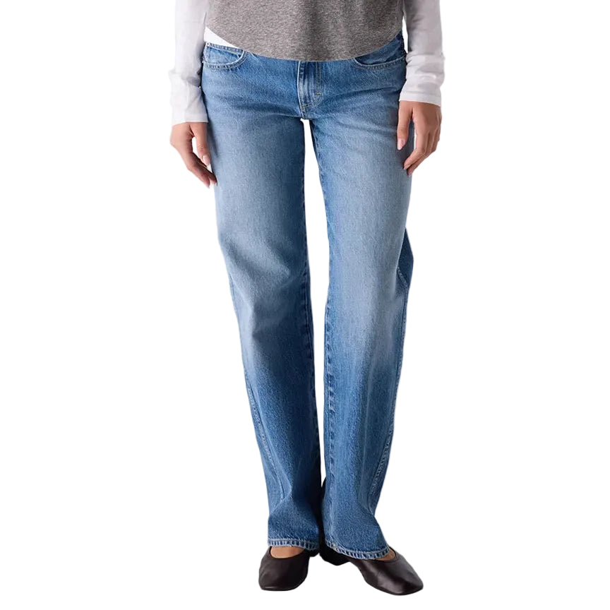 Person wearing a long-sleeve shirt and blue jeans on a white background