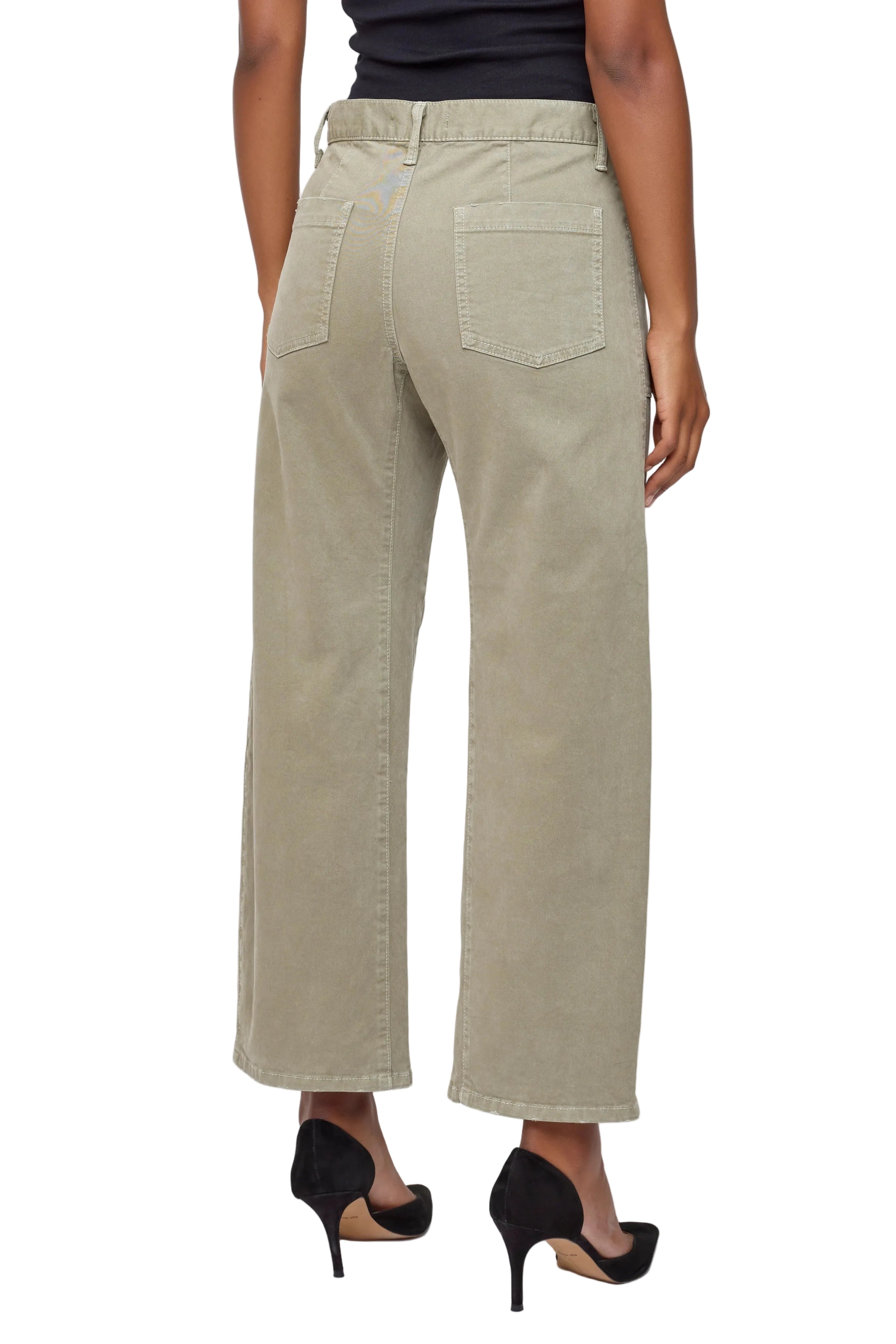 Khaki pants worn by a person on a white background
