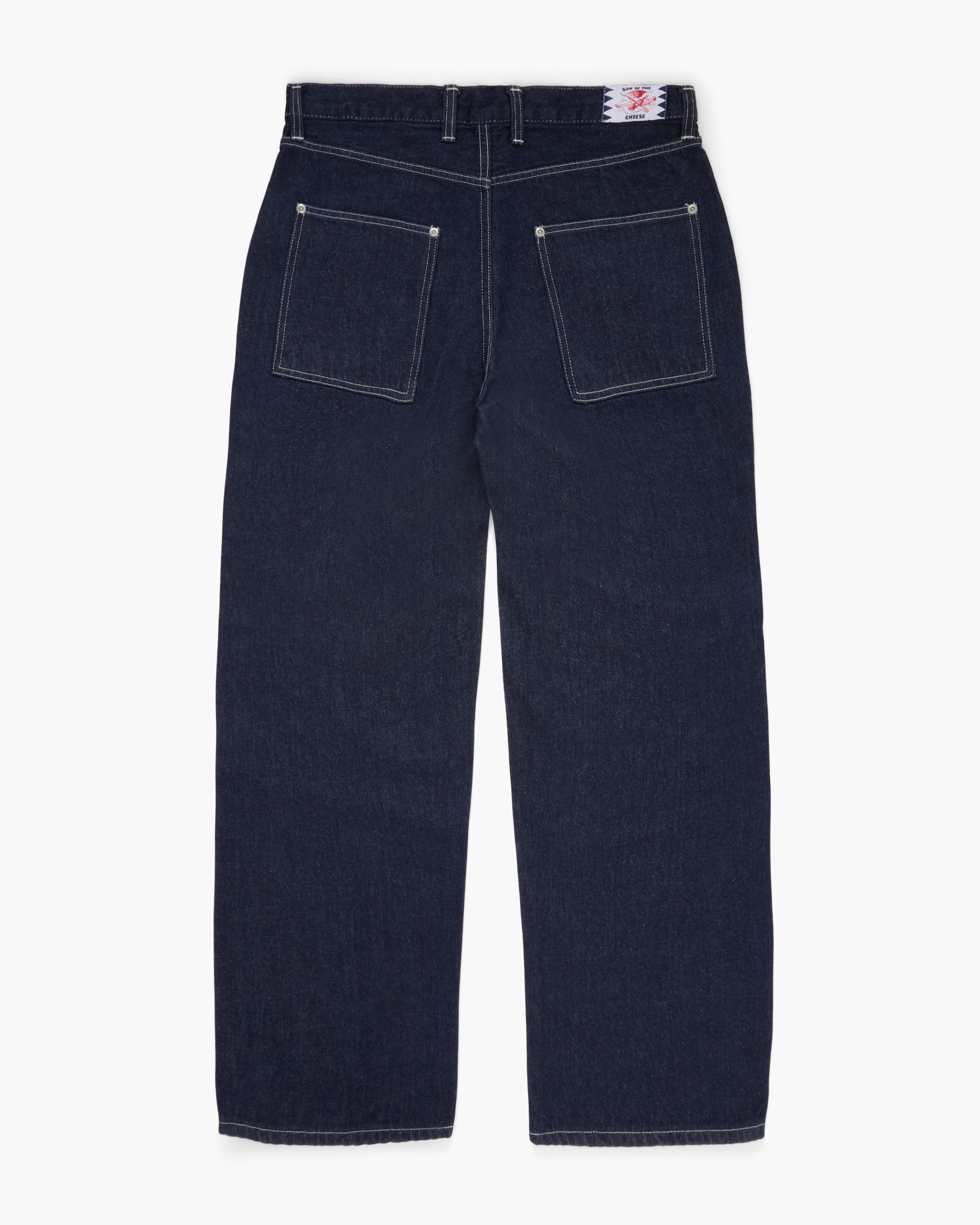 Wide-leg dark blue jeans on a white background