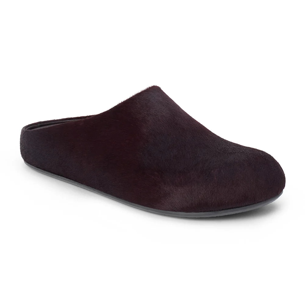 A single dark plum-brown mule slipper with a soft textured upper and a dark gray sole, shown from a three-quarters angle on a white background.