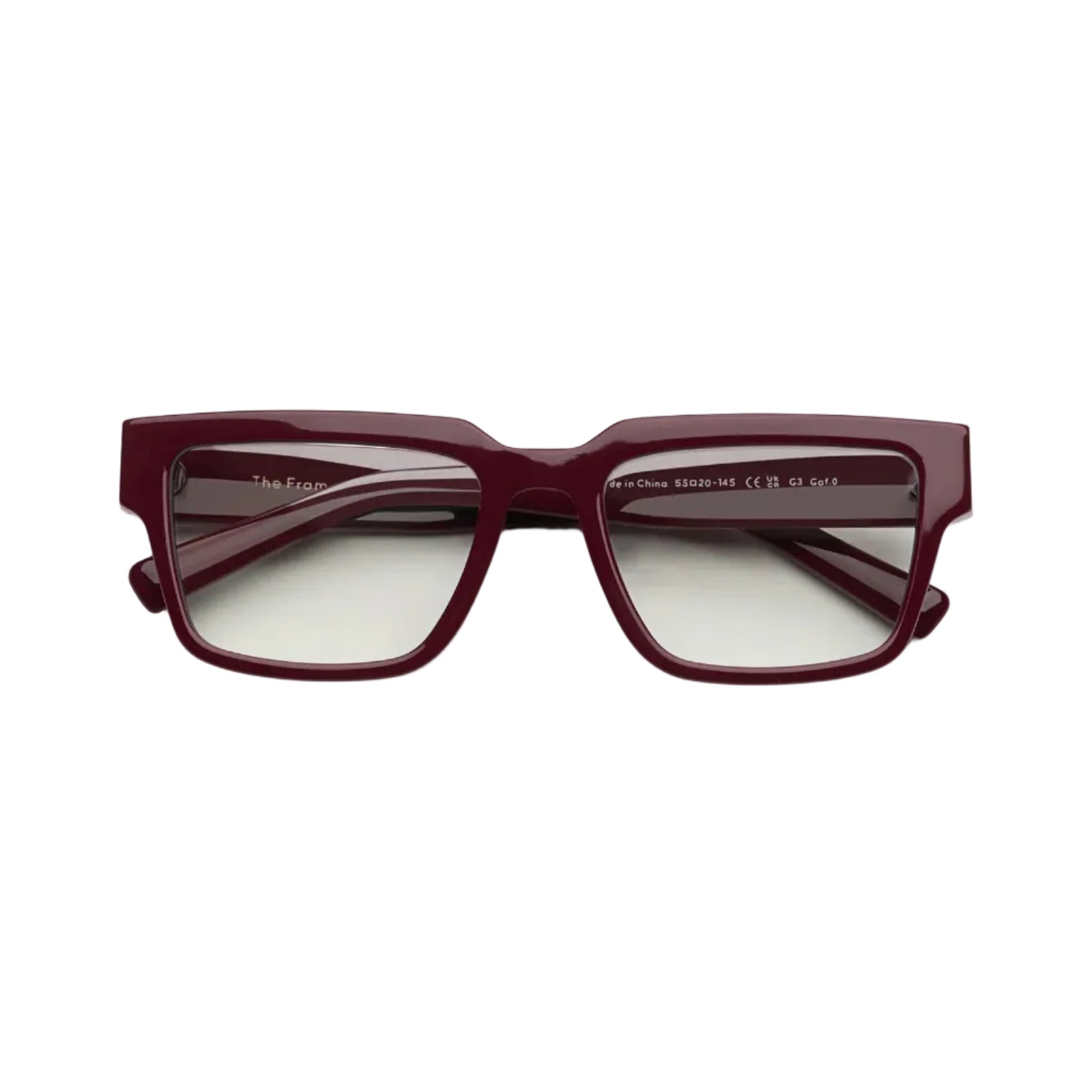 A pair of square-framed eyeglasses with a translucent burgundy acetate frame and clear lenses, displayed on a clean white background.