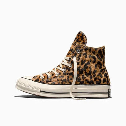 Leopard print high top Converse on a white background