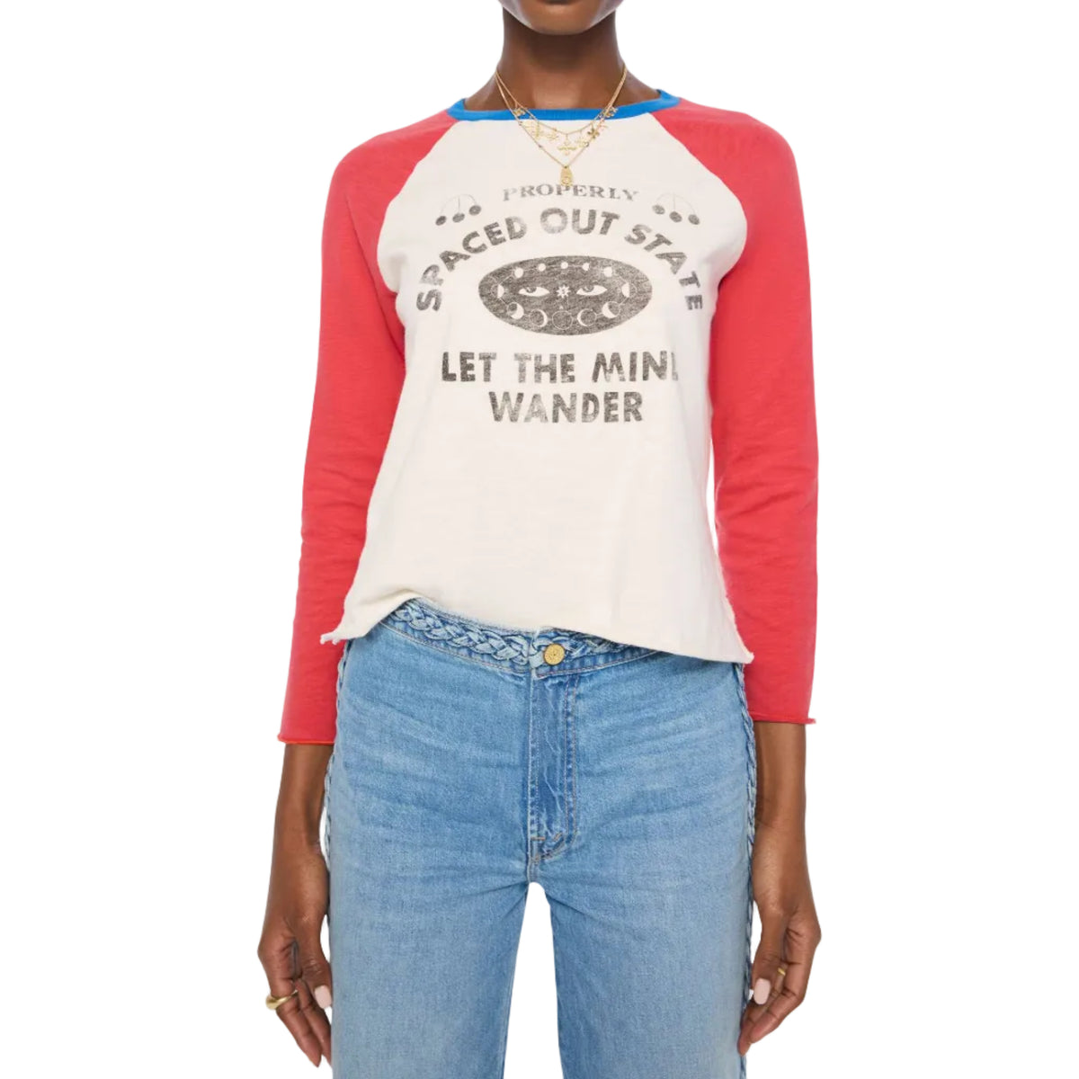 Person wearing a red and white baseball shirt with text and blue jeanson a white background