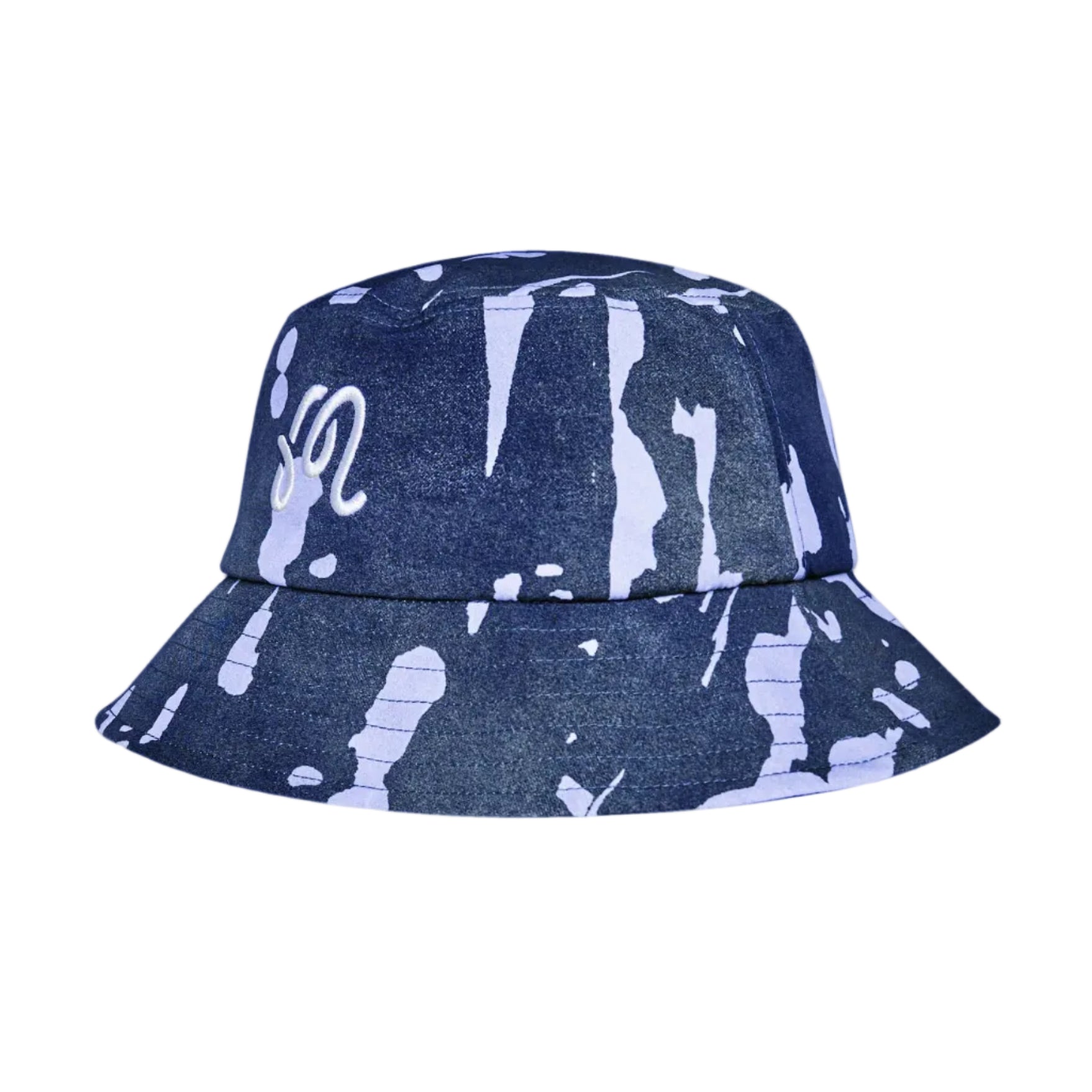 A bucket hat featuring a dark blue denim-like base with a white paint splatter pattern and a white script logo on the side, shown against a plain white background.