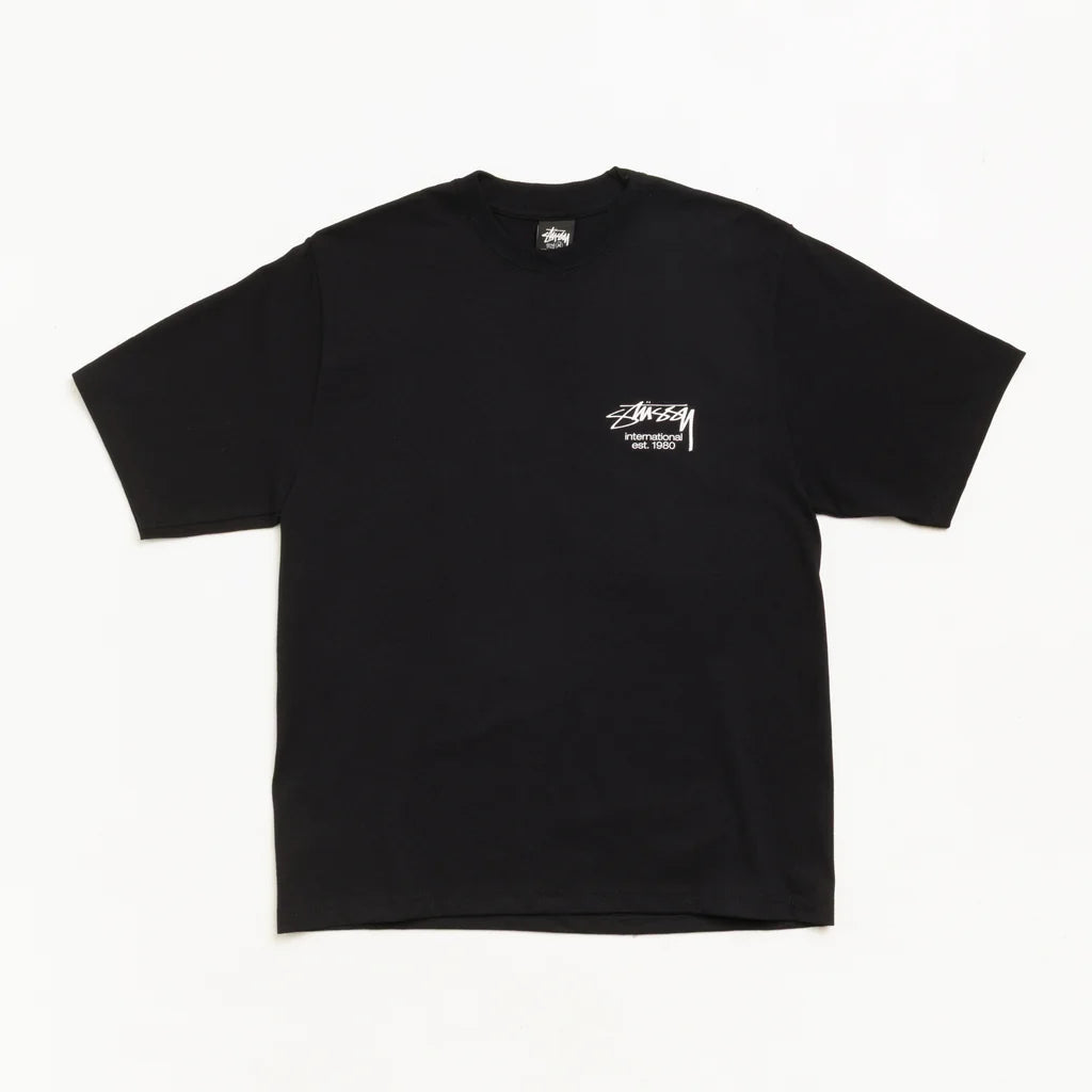 A black short-sleeve crewneck t-shirt with a small white Stüssy logo printed on the left chest, displayed flat against a clean white background.