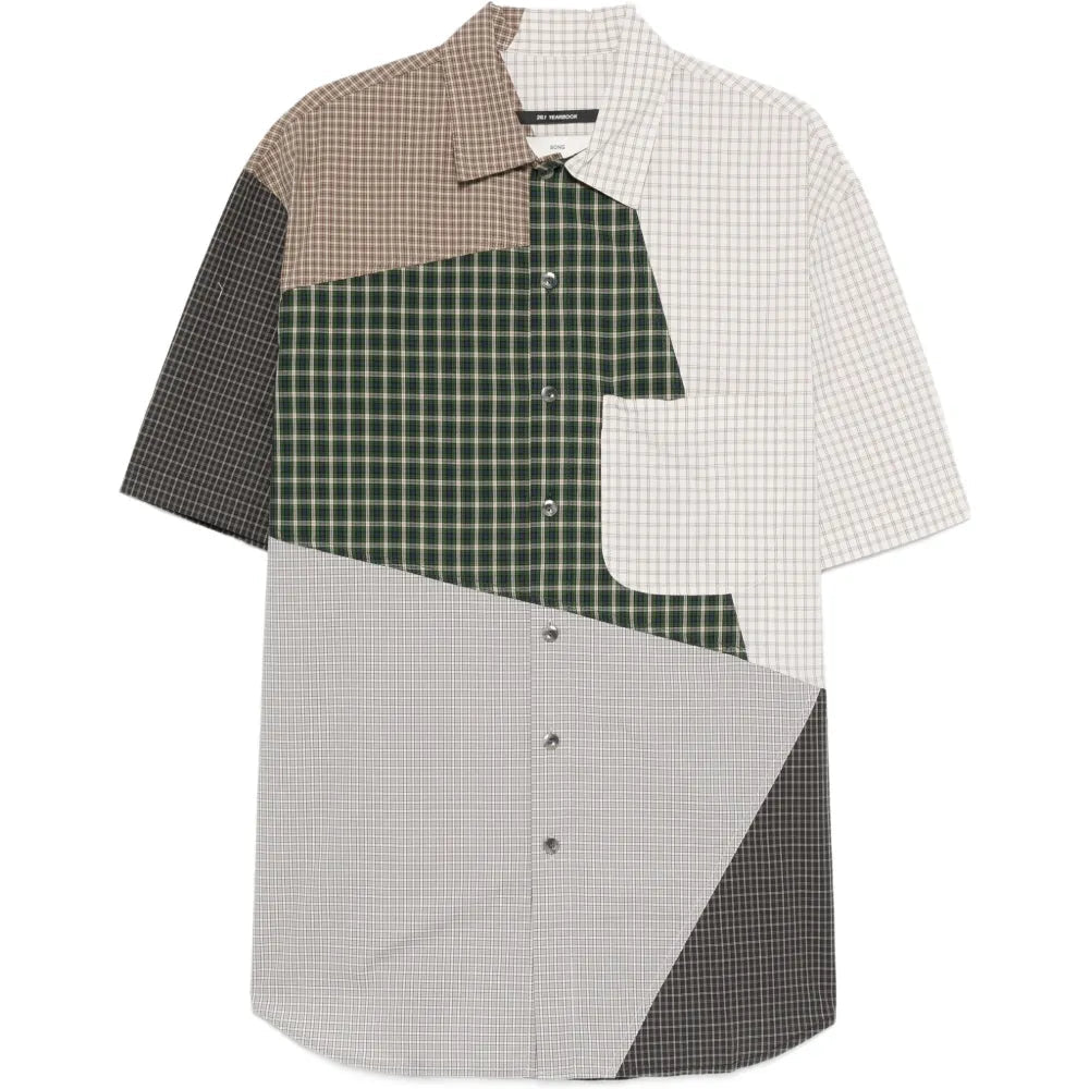 Short sleeved button down shirt in multi-colorblock check on a white background