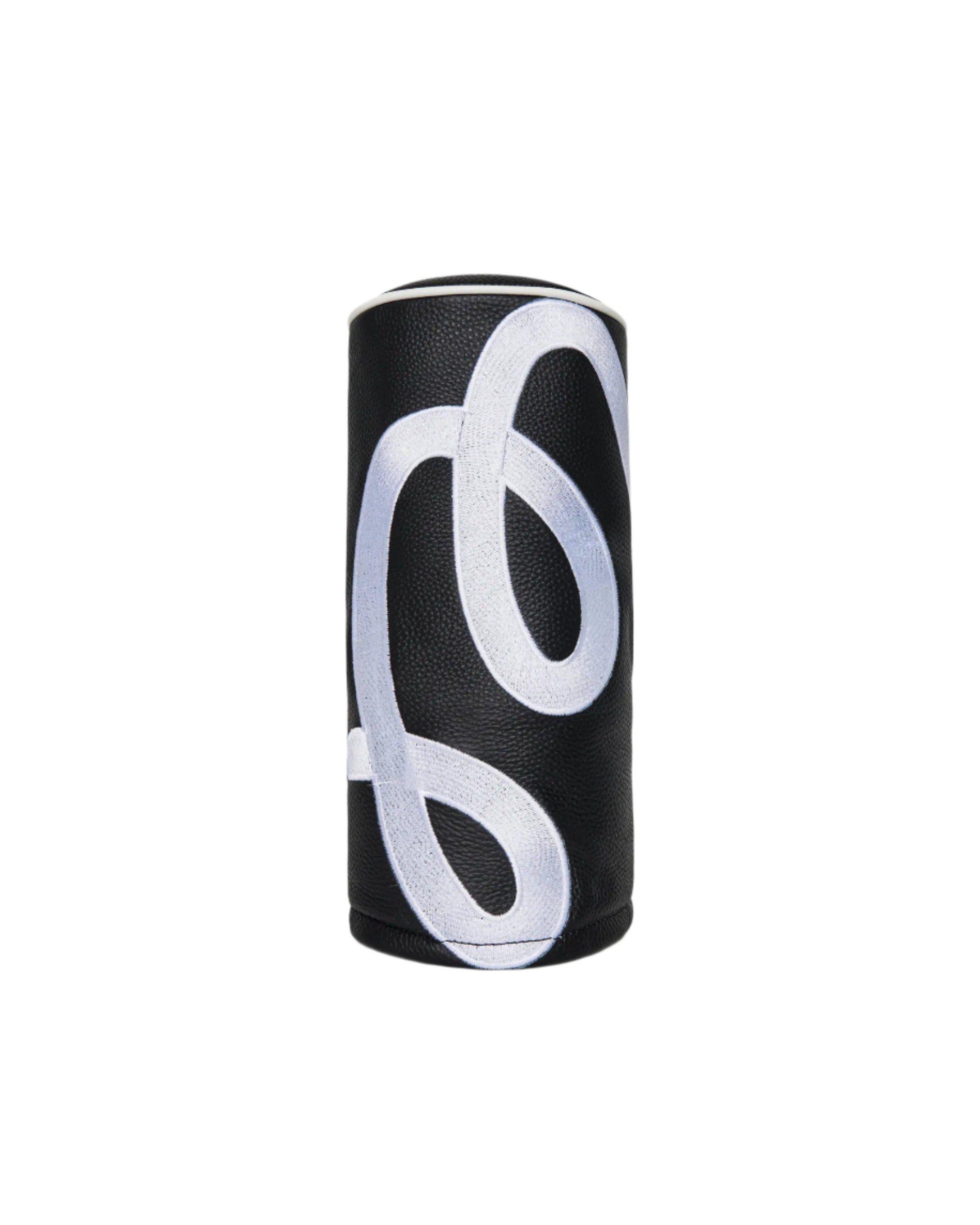 Black cylindrical object with white abstract design on a white background