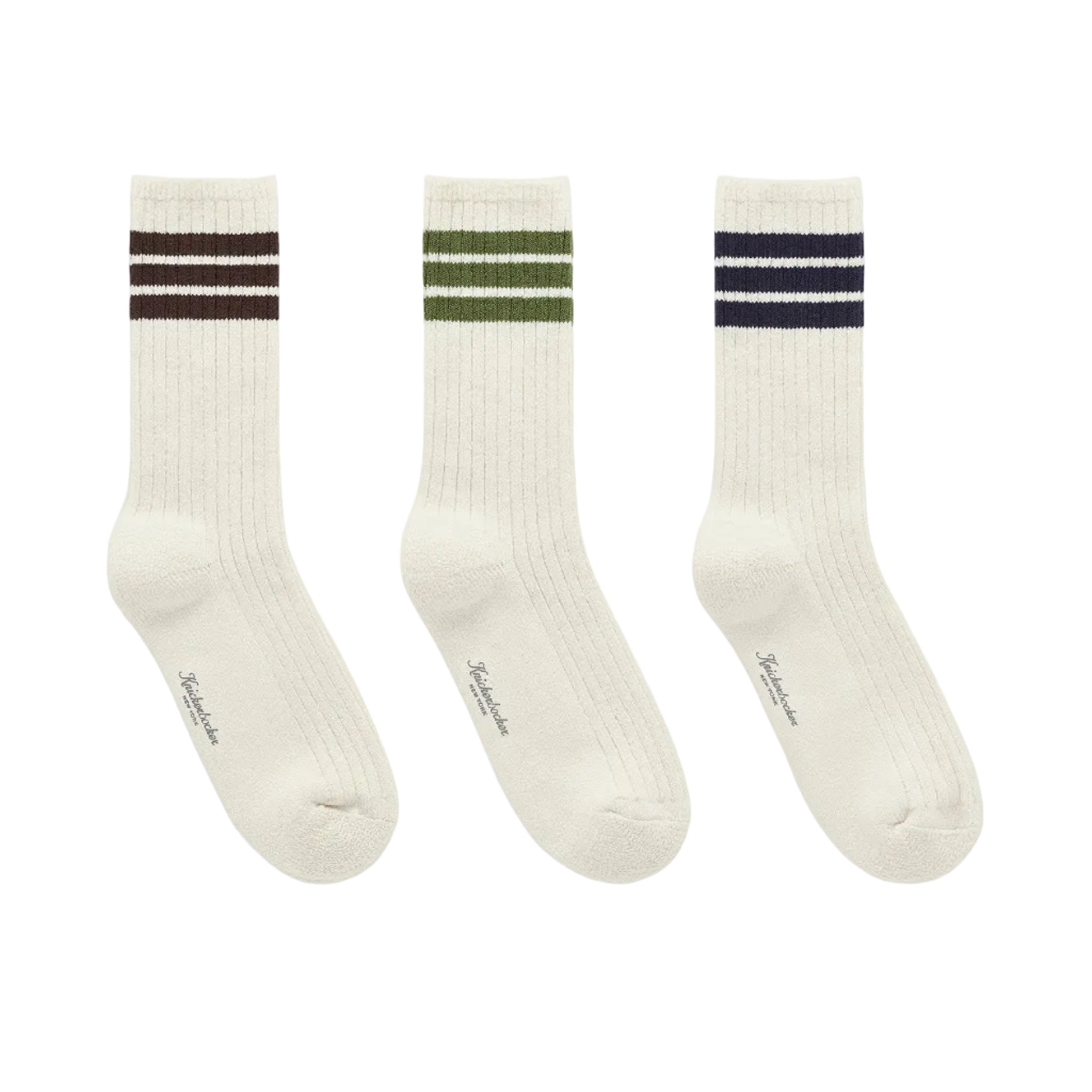 Three pairs of white socks with colored stripes on a white background