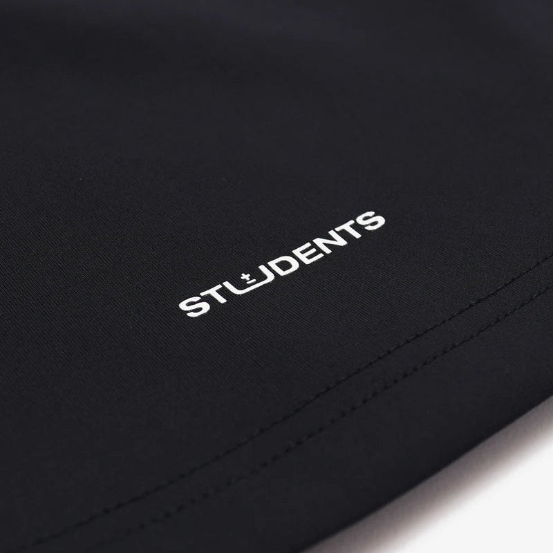 Black fabric with 'STUDENTS' printed in white on a white background