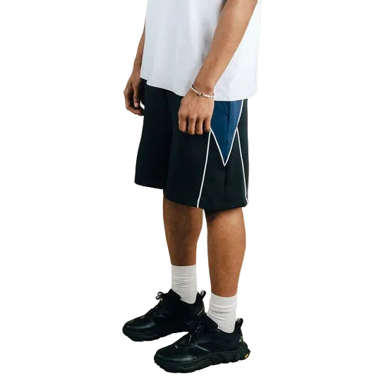 Person wearing a white t-shirt and black shorts on a white background