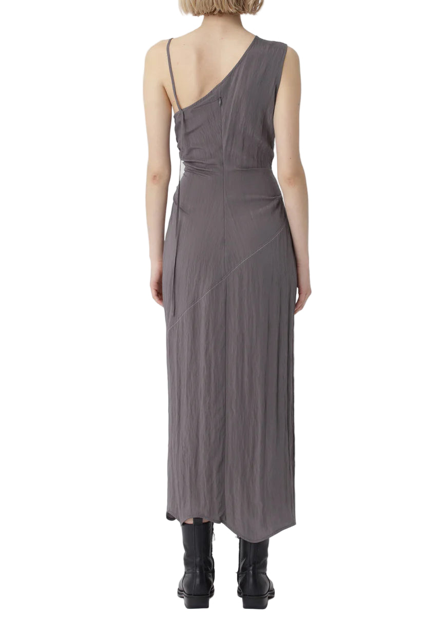 Woman wearing a gray one-shoulder dress on a white background