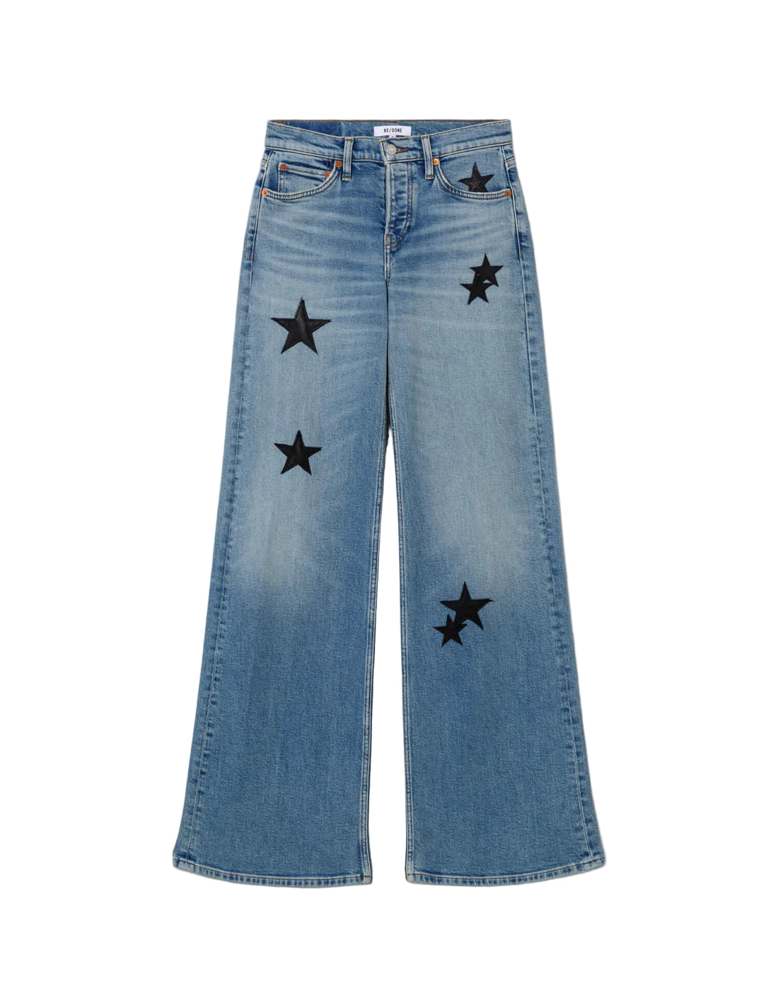 Blue jeans with star patches on a white background