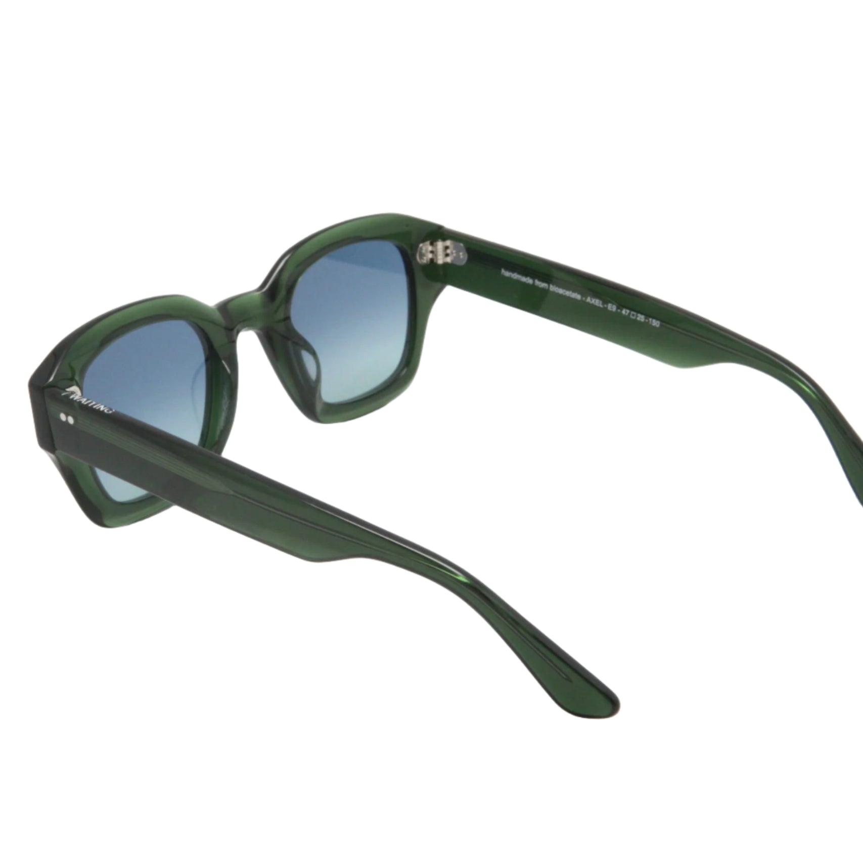 Green sunglasses on a white background