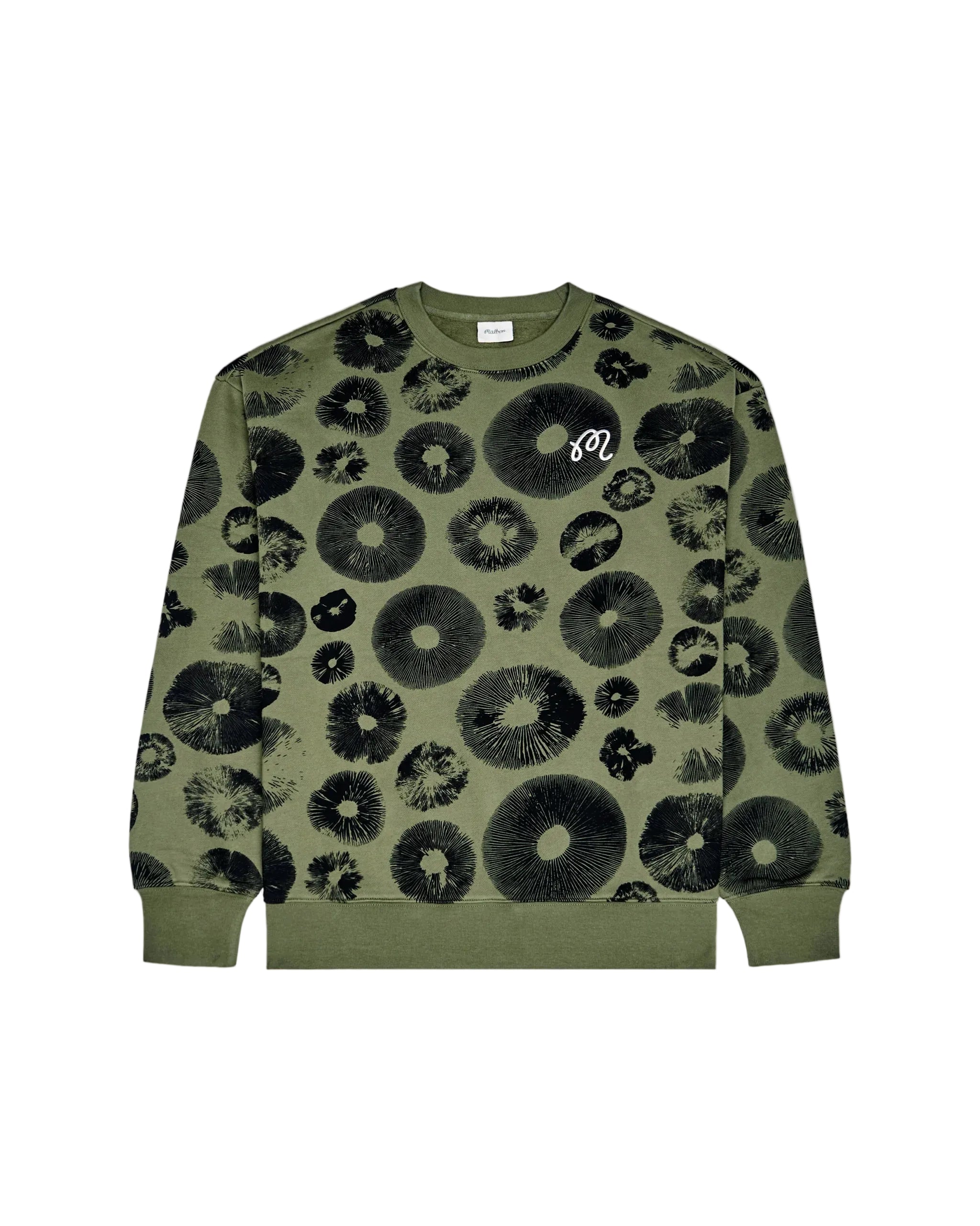 Green sweatshirt with black circular pattern on a white background