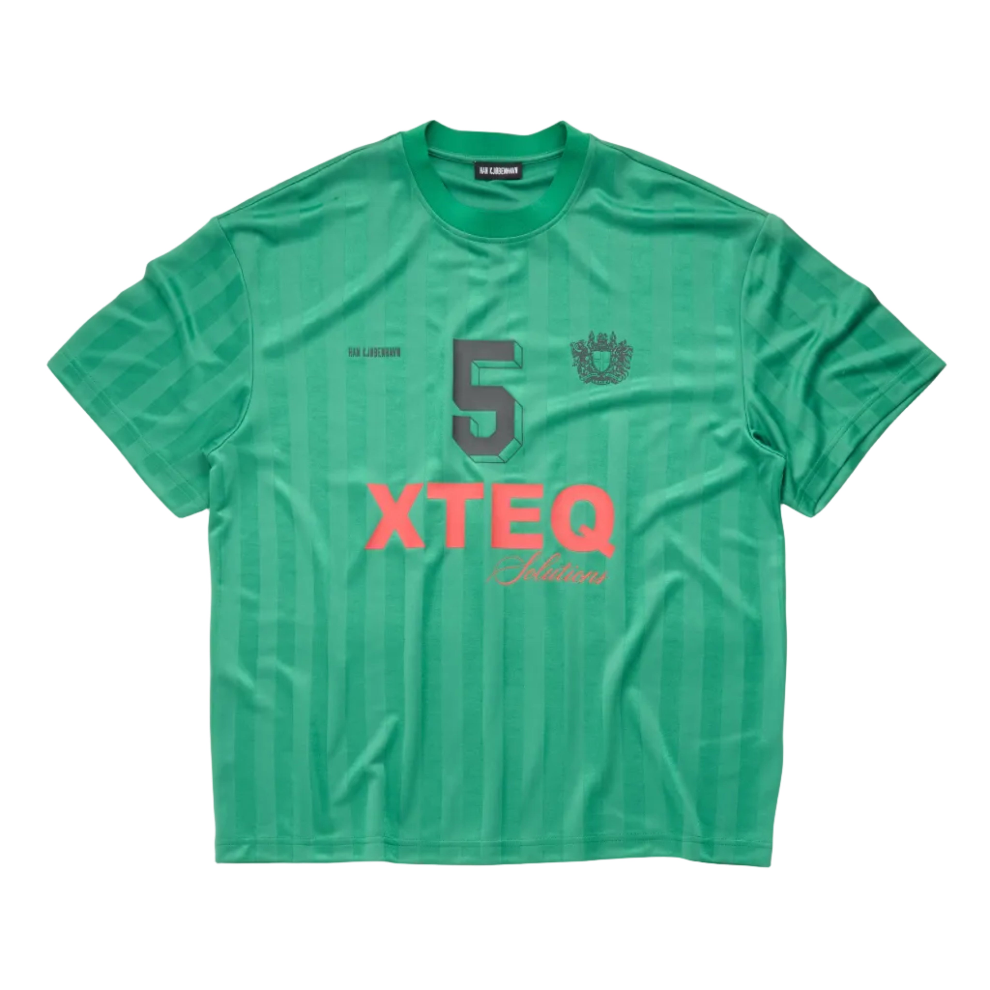 A green short-sleeve athletic t-shirt with vertical stripes, featuring a large gray number 5 on the chest, 'XTEQ' in coral pink text, and a small crest logo, laid flat against a white background.