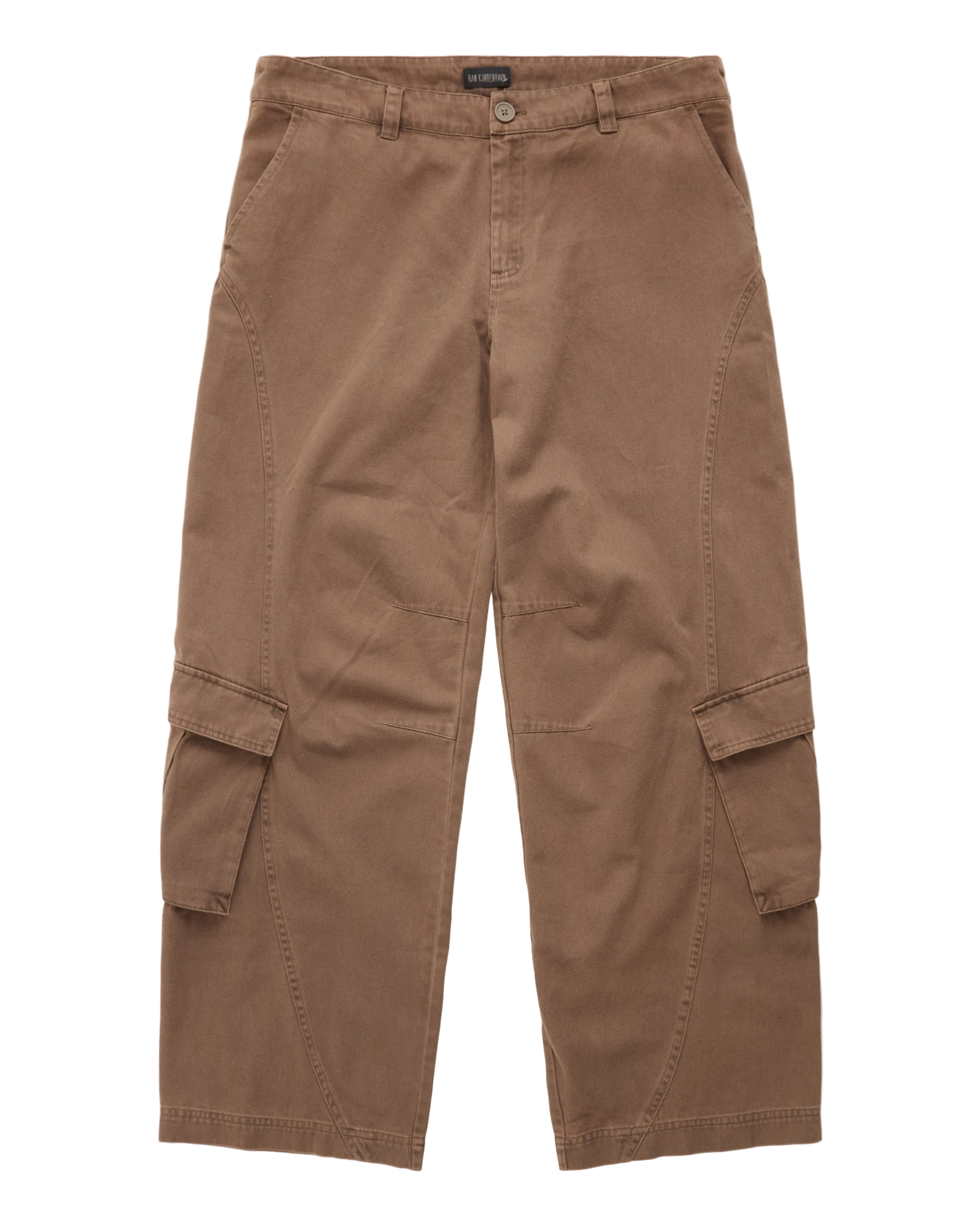 A pair of brown cargo pants with side flap pockets, laid flat against a white background.