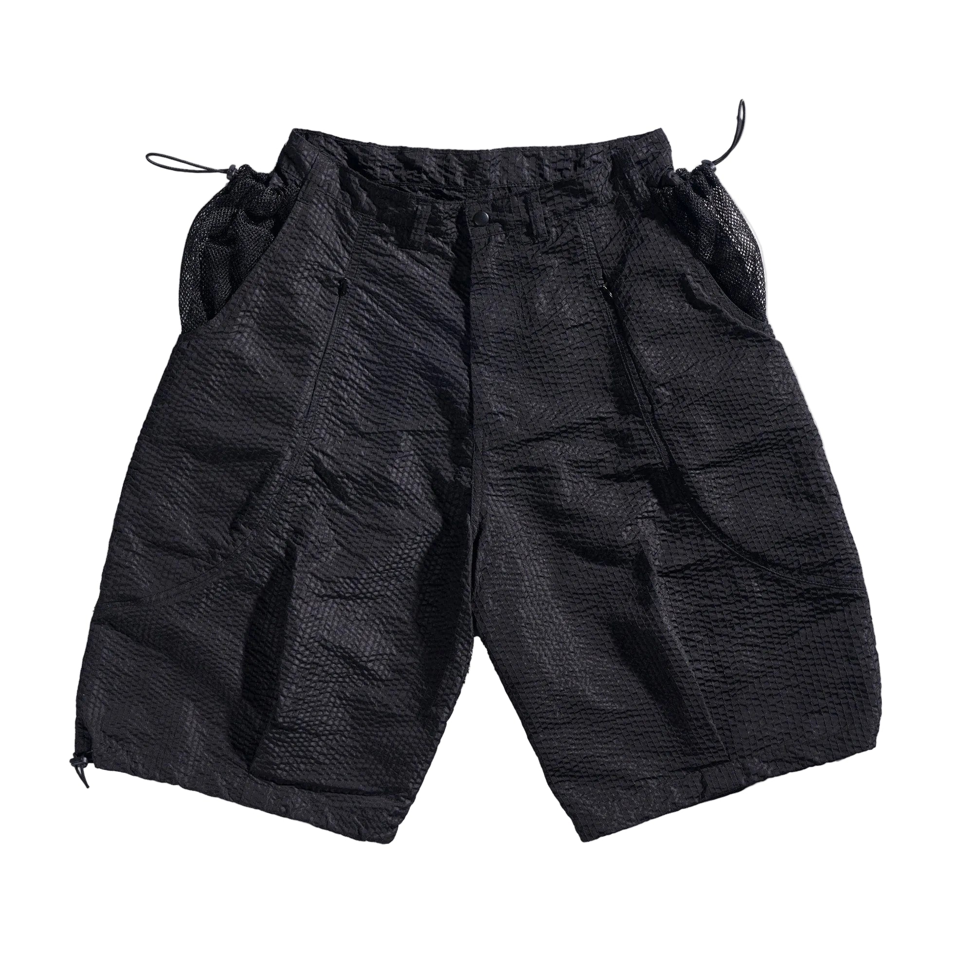 Black shorts with drawstring on a white background