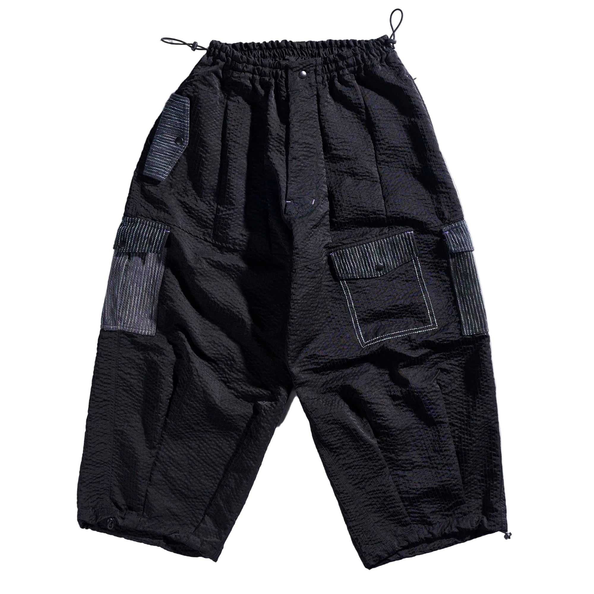 Black cargo pants with multiple pockets on a white background