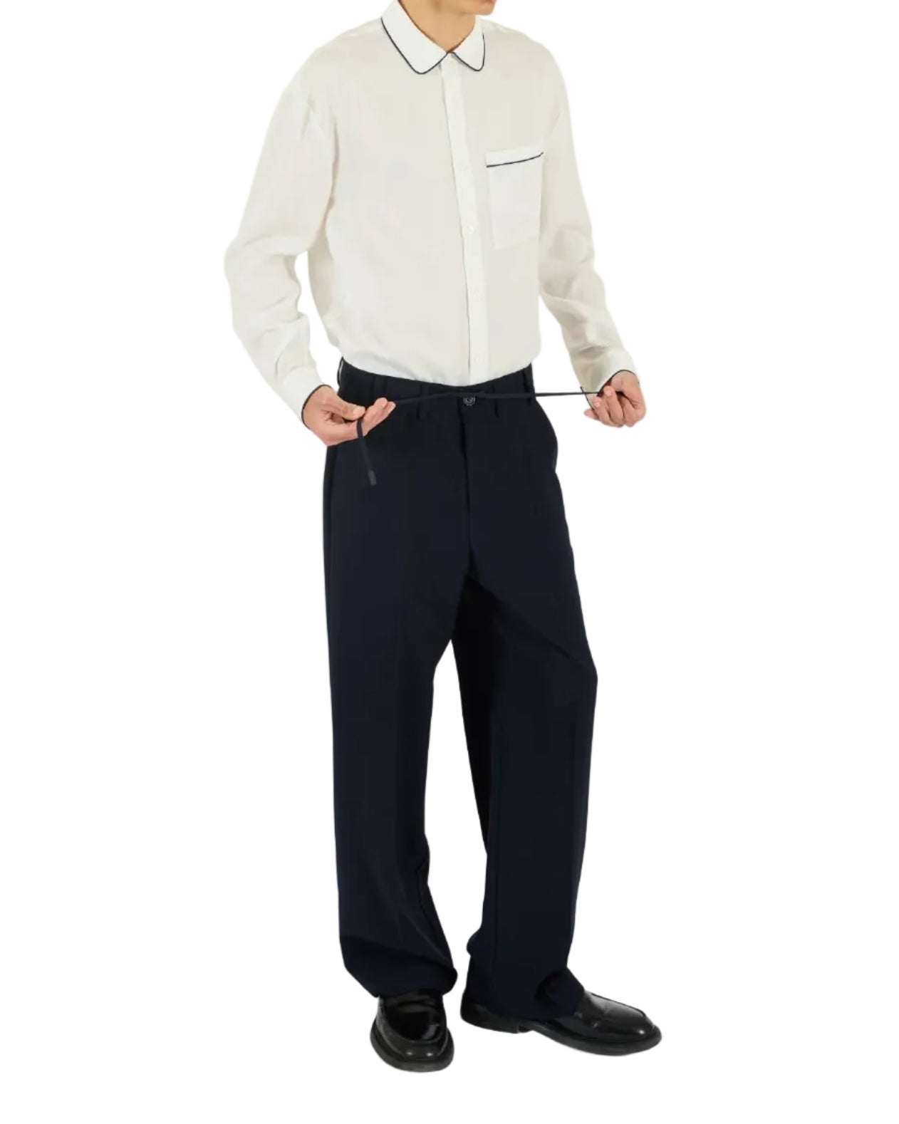 Person wearing a white shirt with a collar and navy pants on a white background