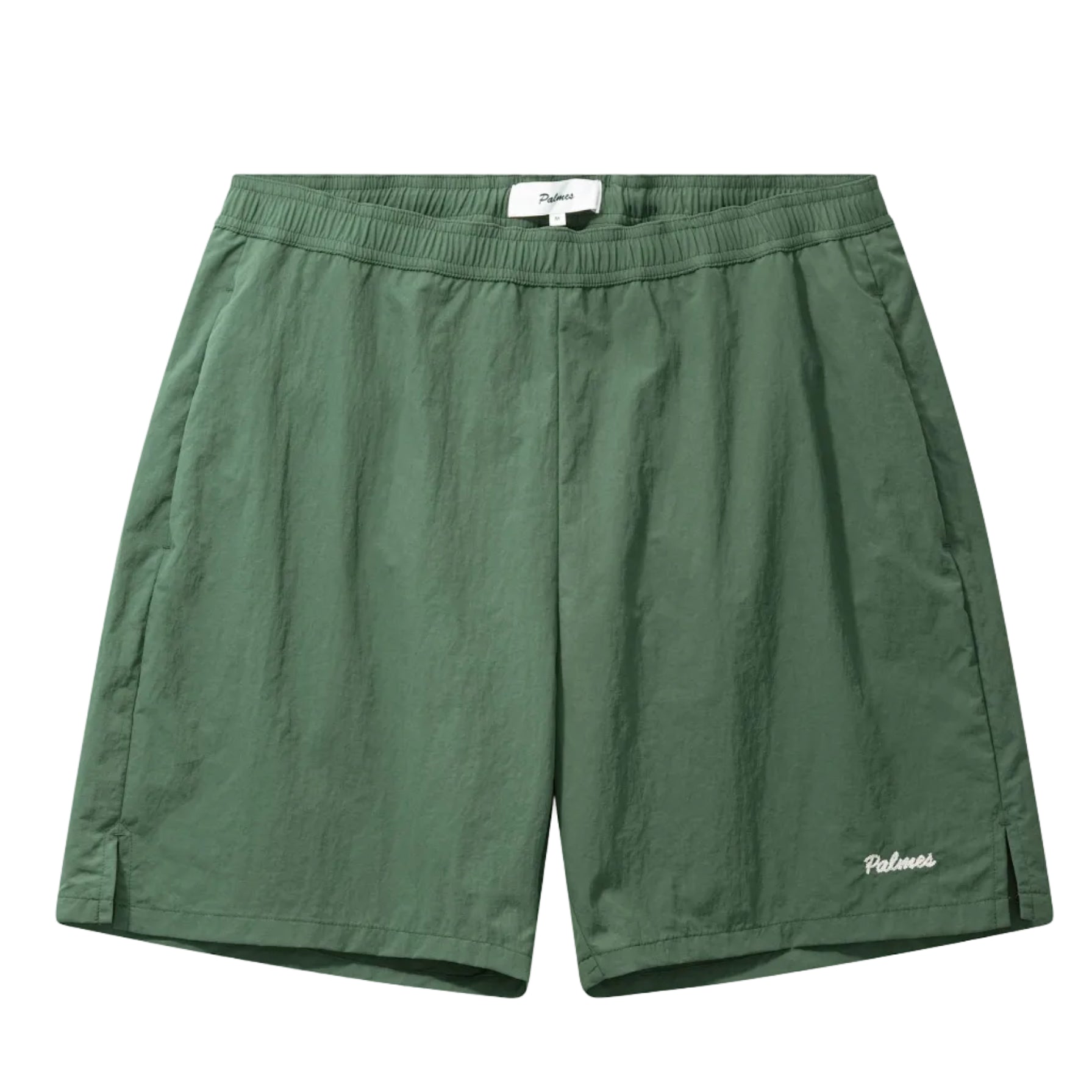 Green athletic shorts on a white background