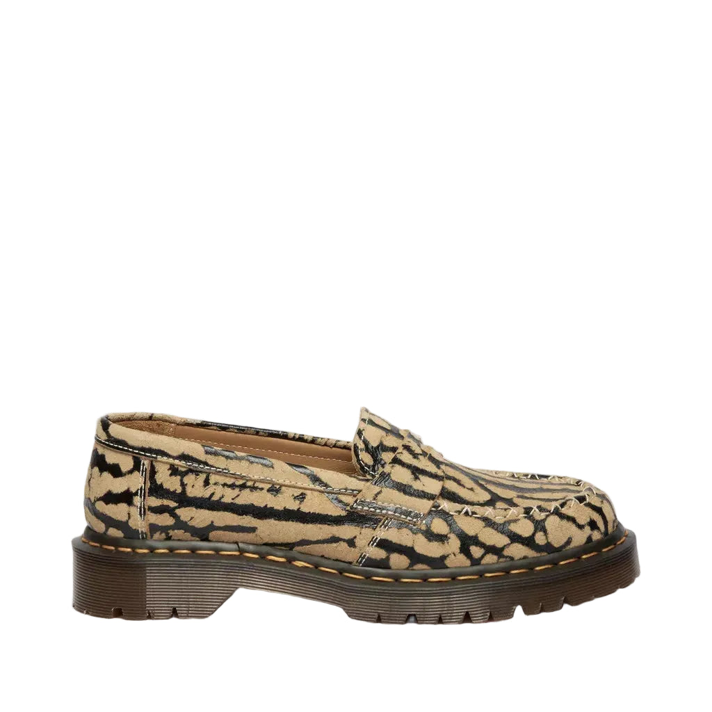 Loafer shoe with a patterned design on a white background