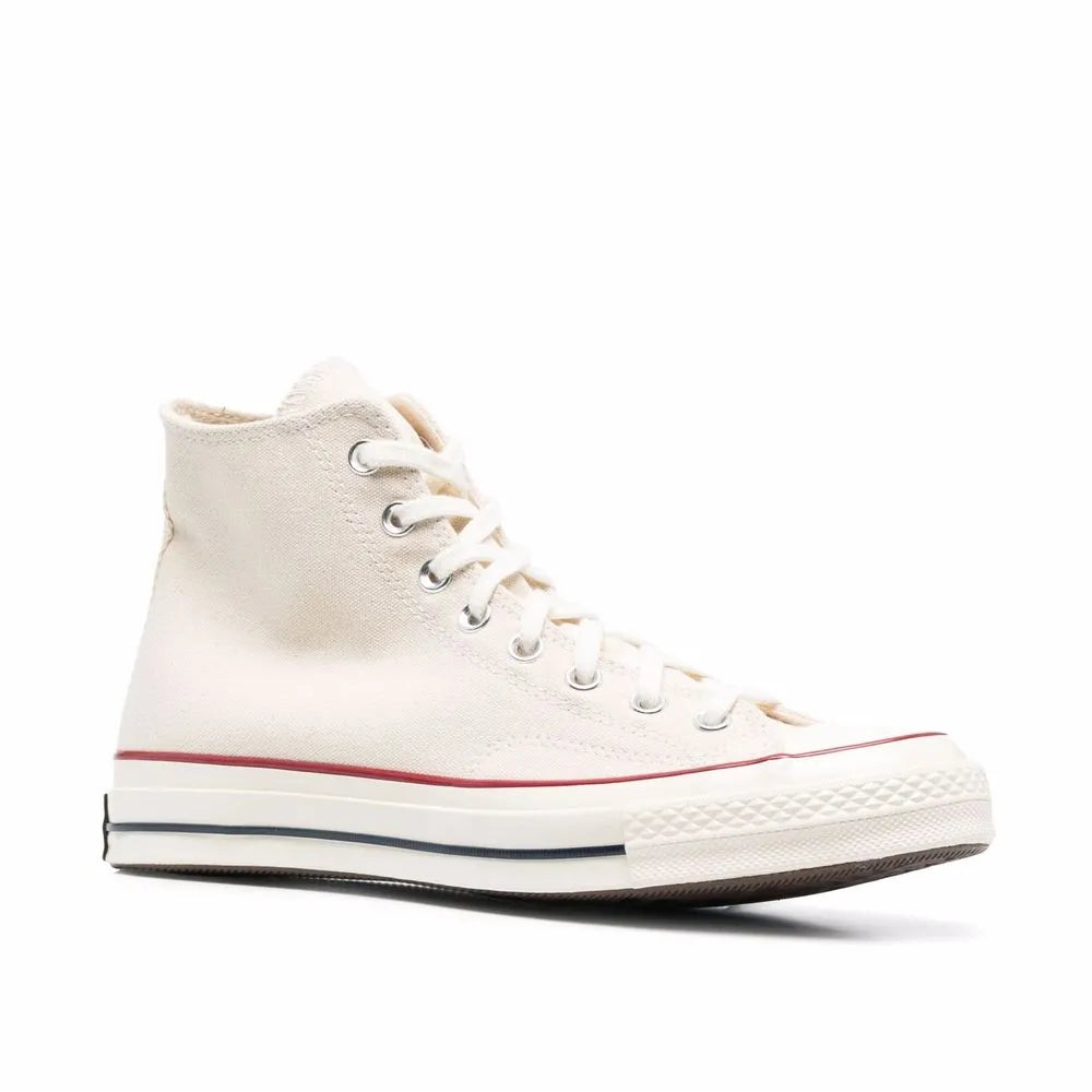 White canvas hi-top sneaker on a white background