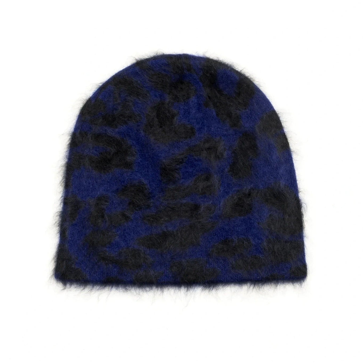 A fuzzy knit beanie hat featuring a dark blue and black leopard print pattern, shown against a plain white background.