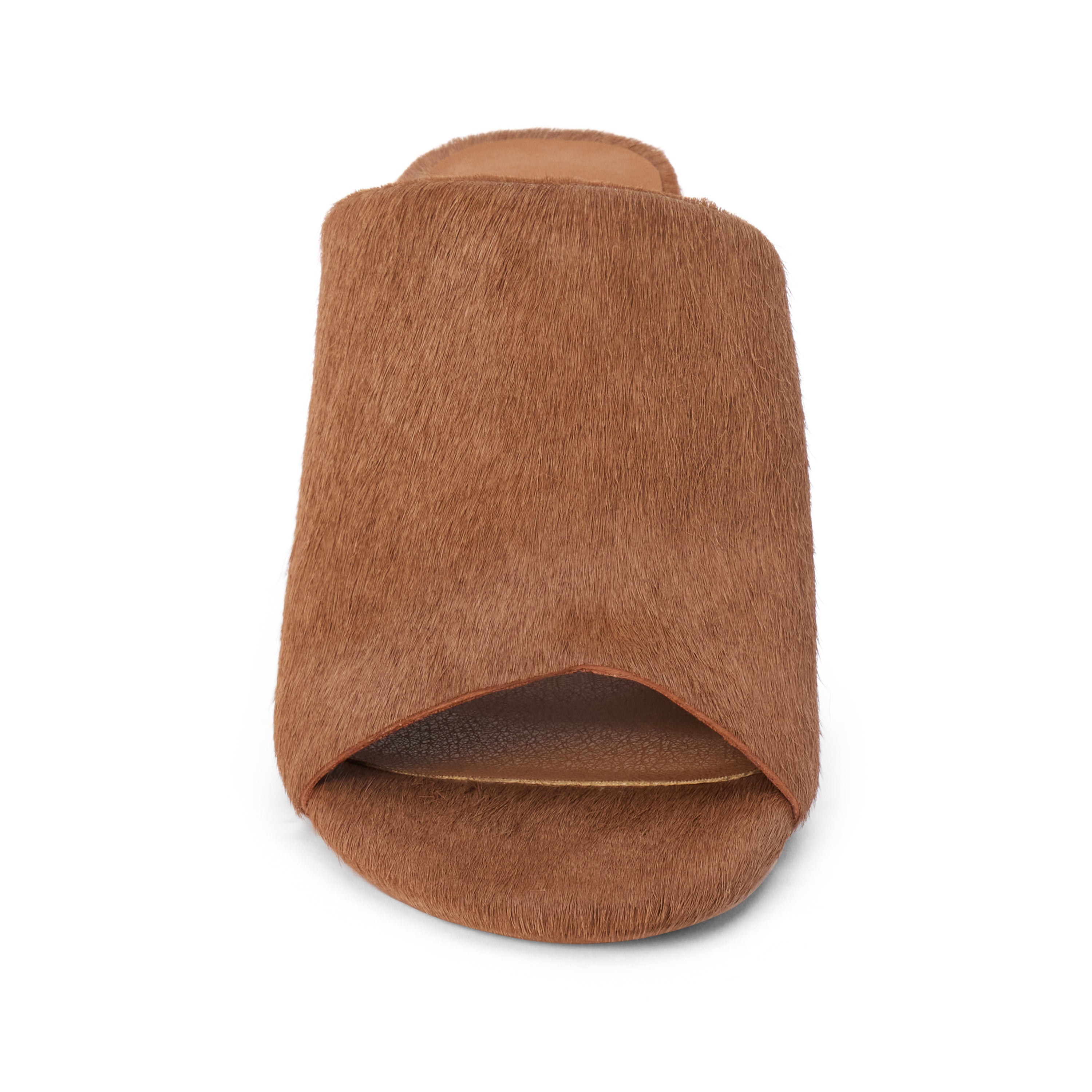A single brown slide sandal with a textured, hair-on-hide style upper, shown from a top-down view on a white background.