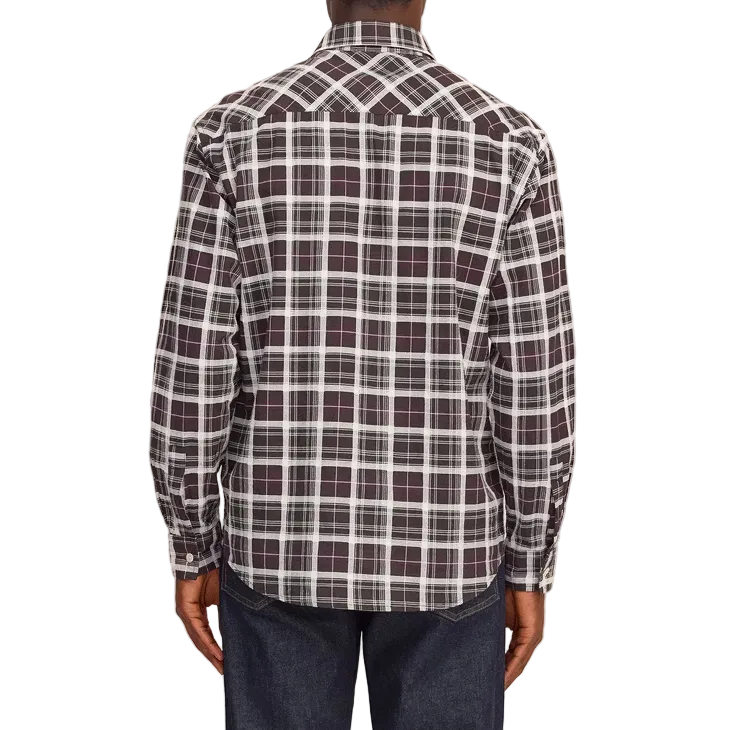 A man viewed from behind wearing a long-sleeve plaid button-up shirt in dark brown, white, and black, paired with dark blue jeans and black shoes, against a white background.