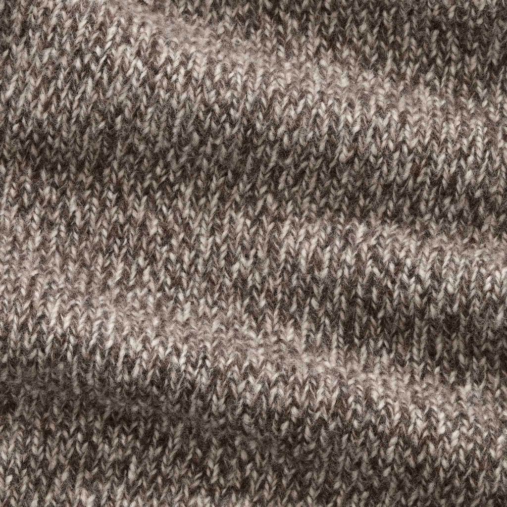Close-up of a textured knit fabric in a heathered taupe-brown and beige colorway, showing the detailed ribbed pattern.
